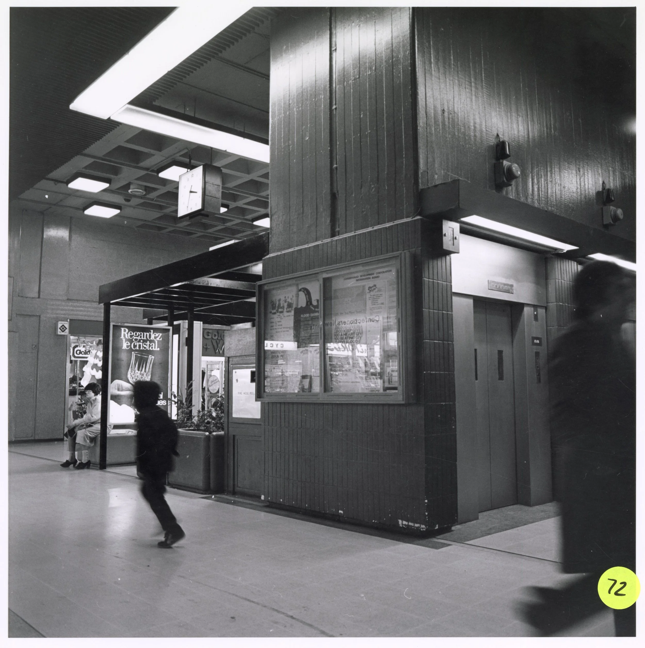 Lifts, seating area and notice board in Phase 1. Photo taken from CDC Collection, held in NLC Archives.