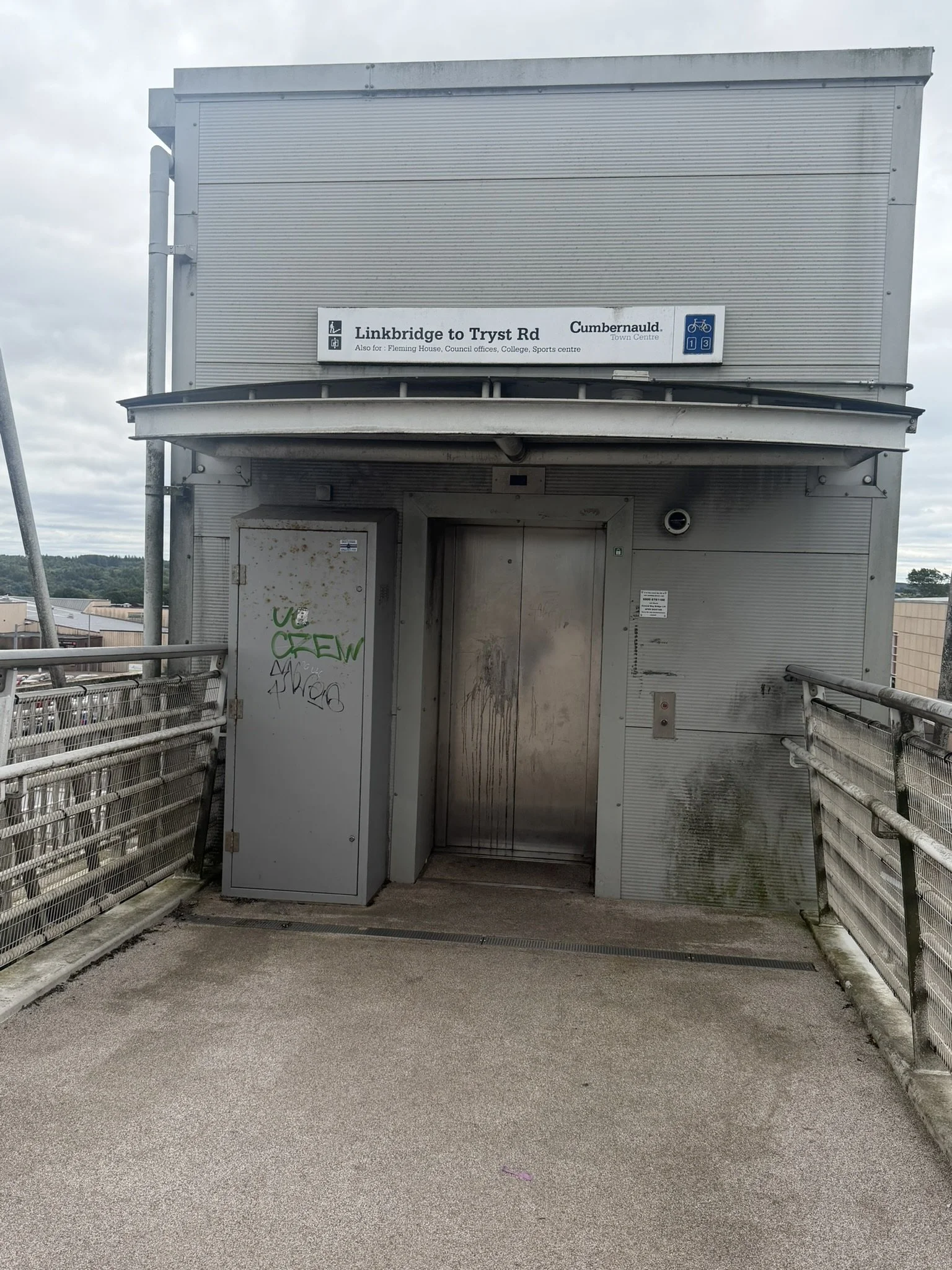 Exterior of lift at top of footbridge