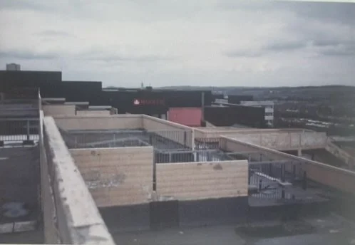 Exterior shot showing the ramps leading from Phase One to the college.
