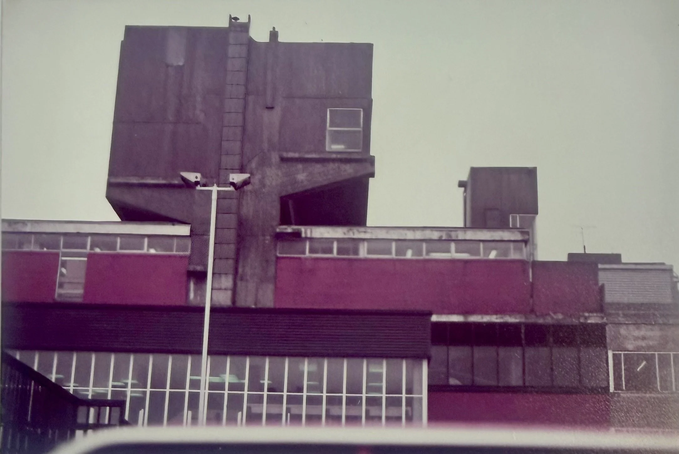 Shot of Phase One of the Town Centre, with the library windows seen in the centre