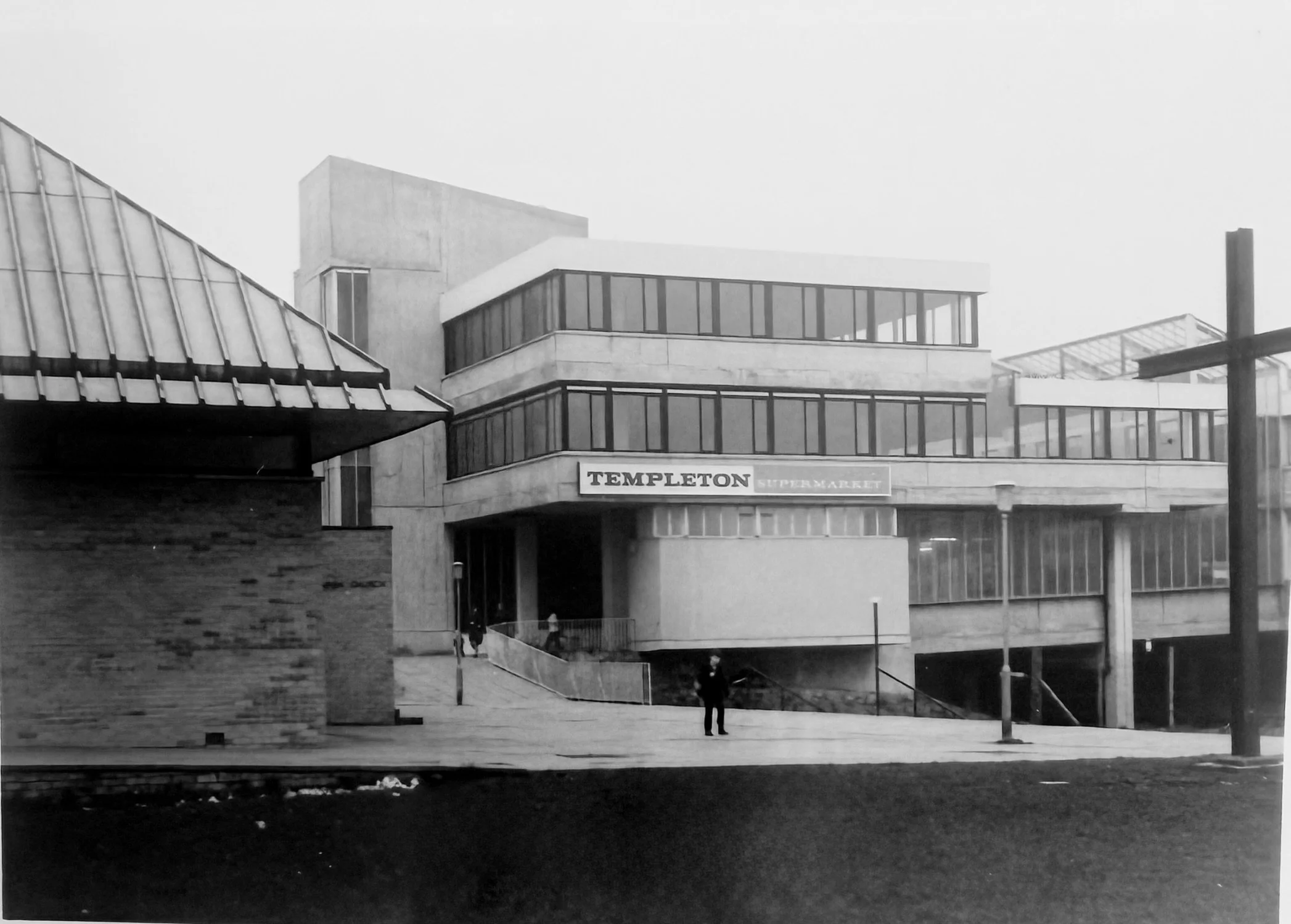 Exterior of Phase 2 showing Templeton's Supermarket. Photo taken from CDC Collection, held in NLC Archives.