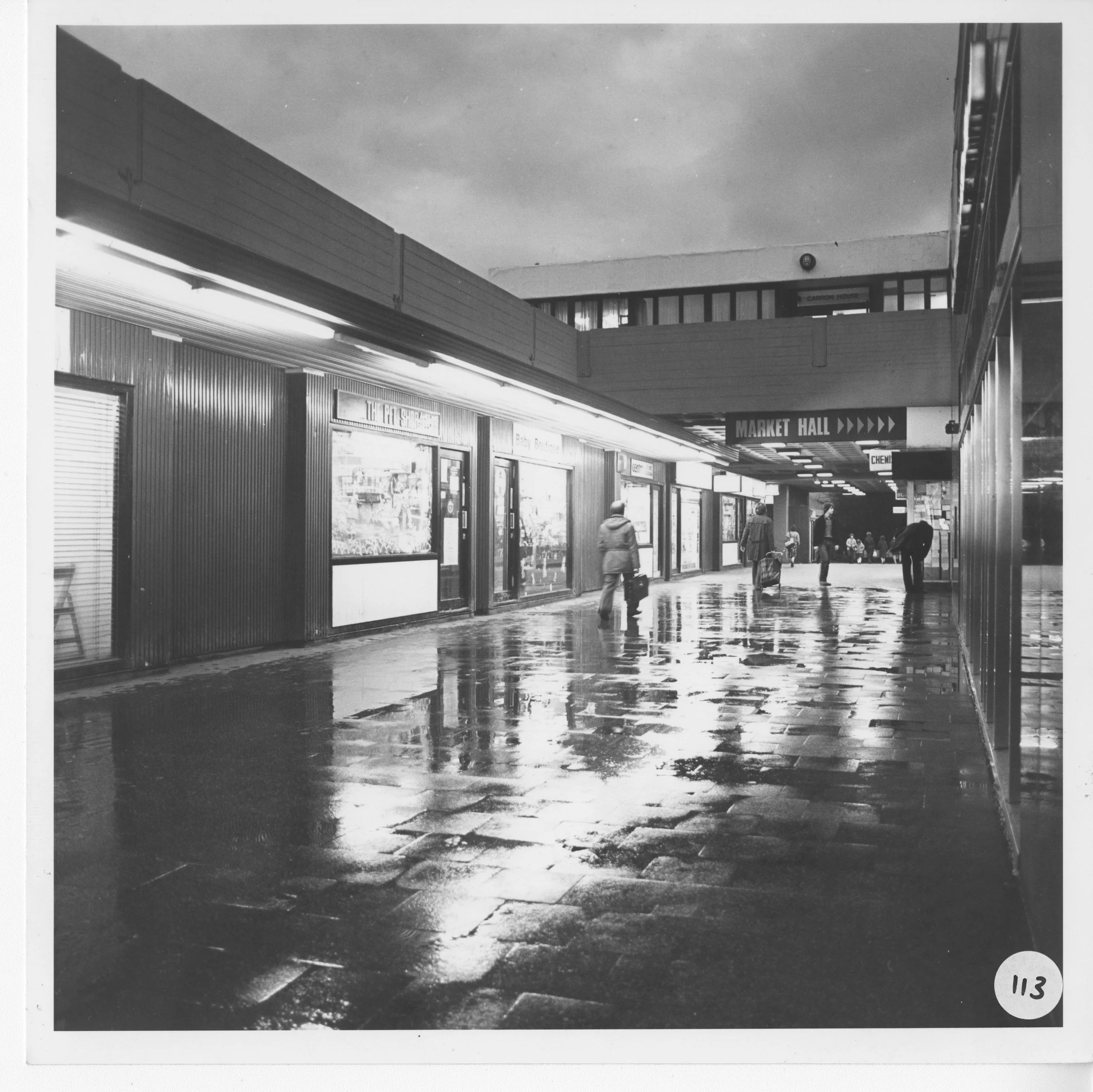 Phase 2 shops, including the Pet Shop. This area would eventually be roofed over. Photo taken from CDC Collection, held in NLC Archives.