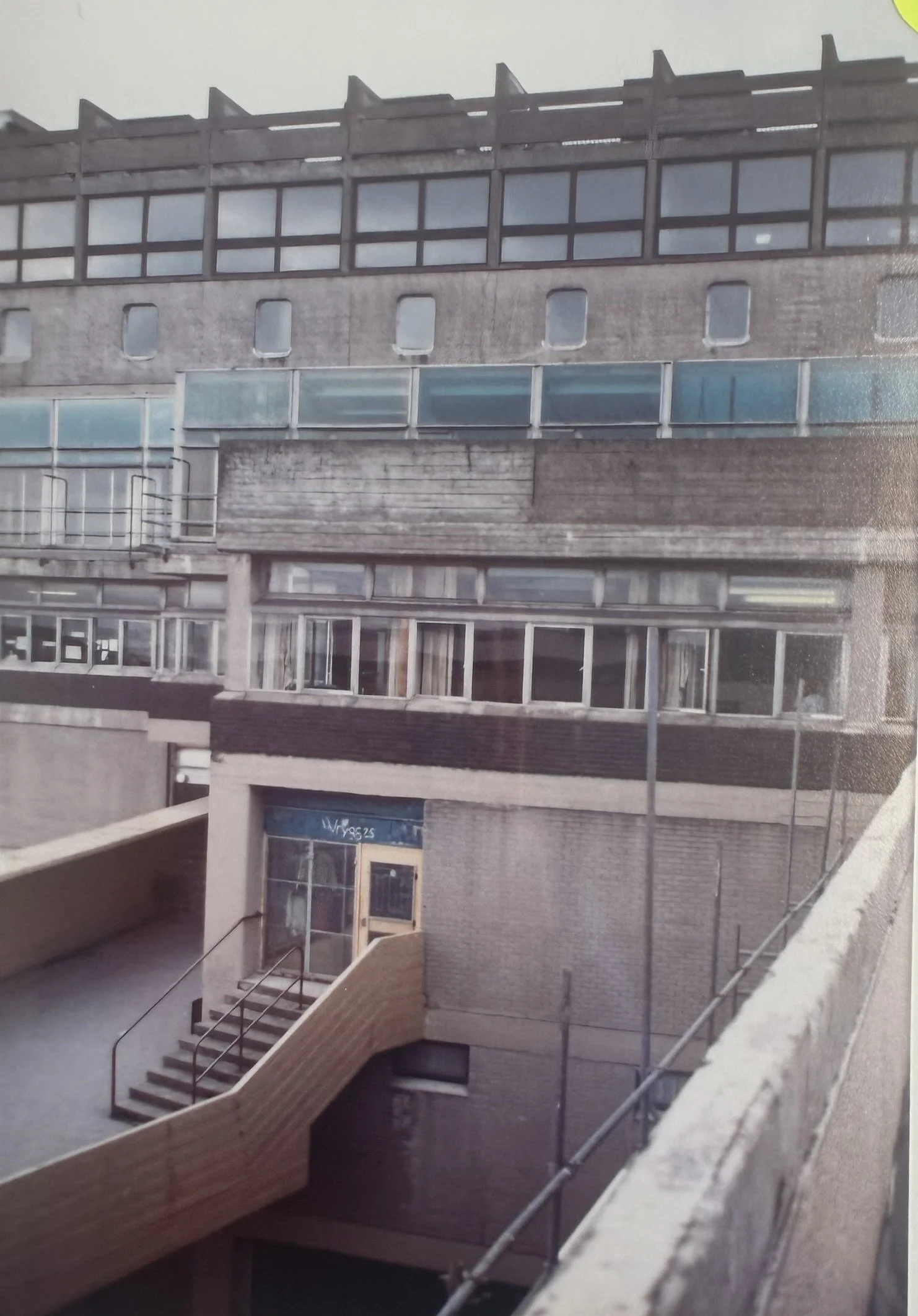 Exterior shot of the building before the blue colouring was replaced with red.