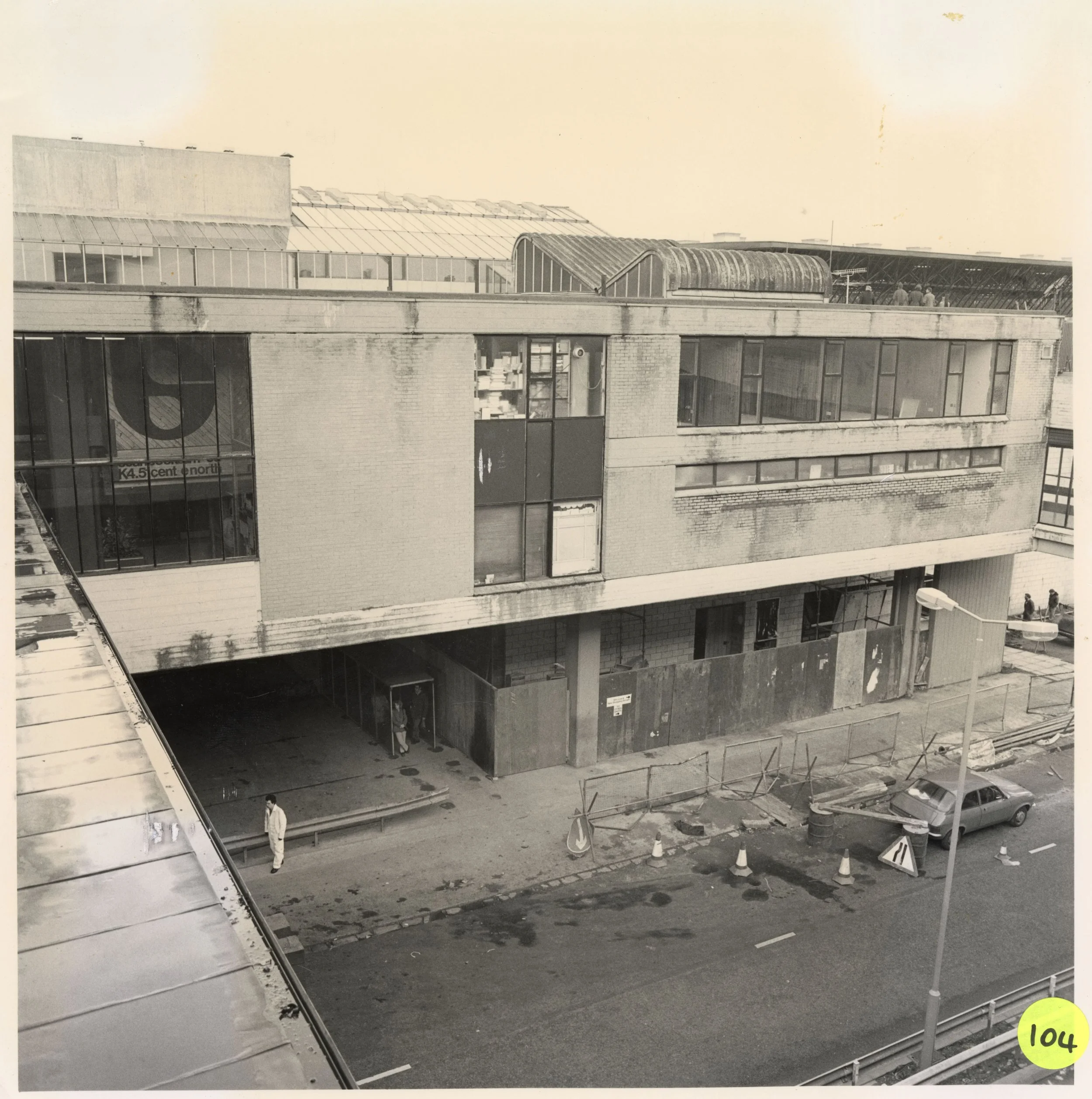 Exterior of building - the Scan can be seen through the window on the left. Photo taken from CDC Collection, held in NLC Archives.