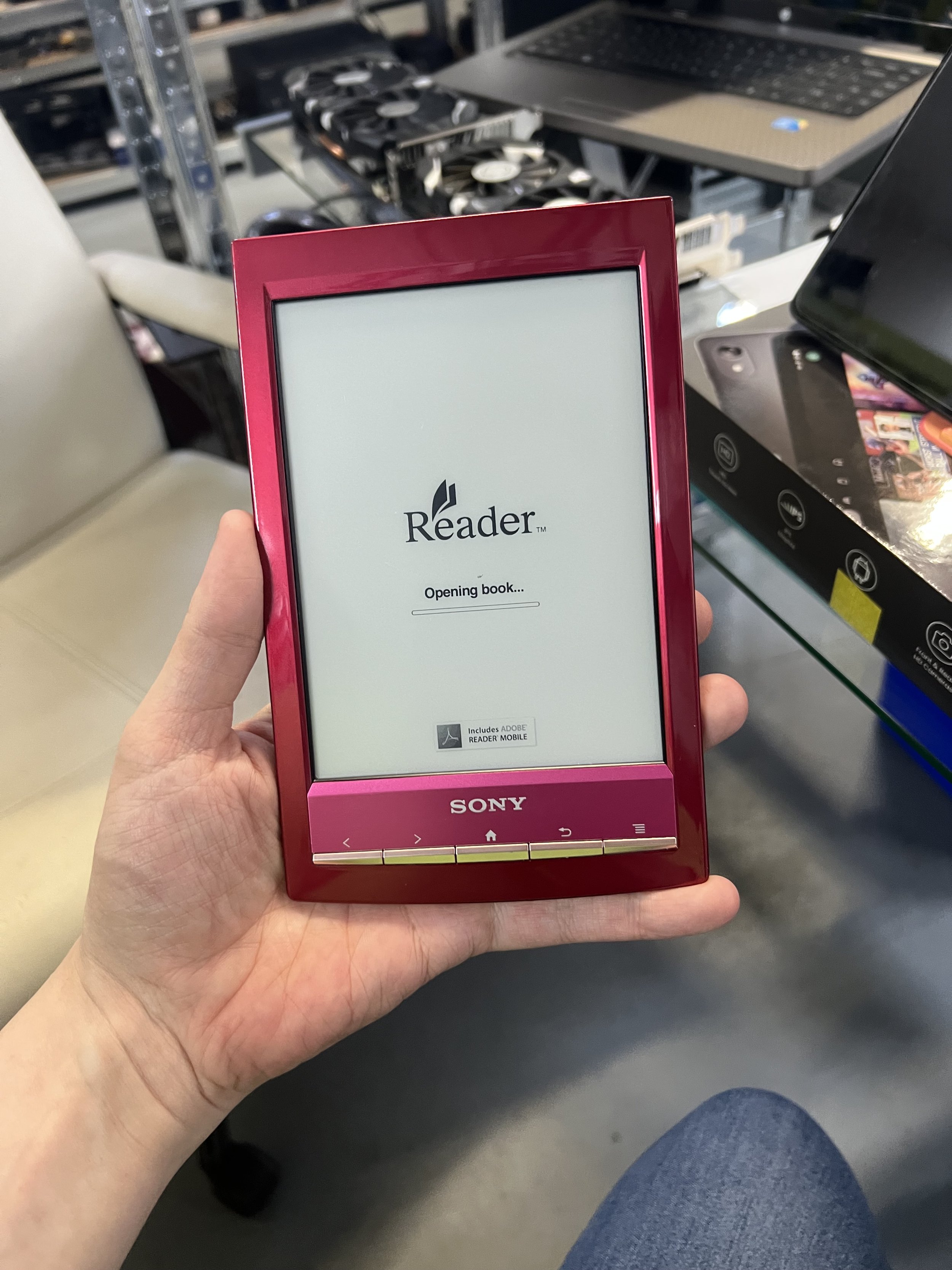 Sony Reader Wi-Fi (Model: PRS-T1), features charging cable.