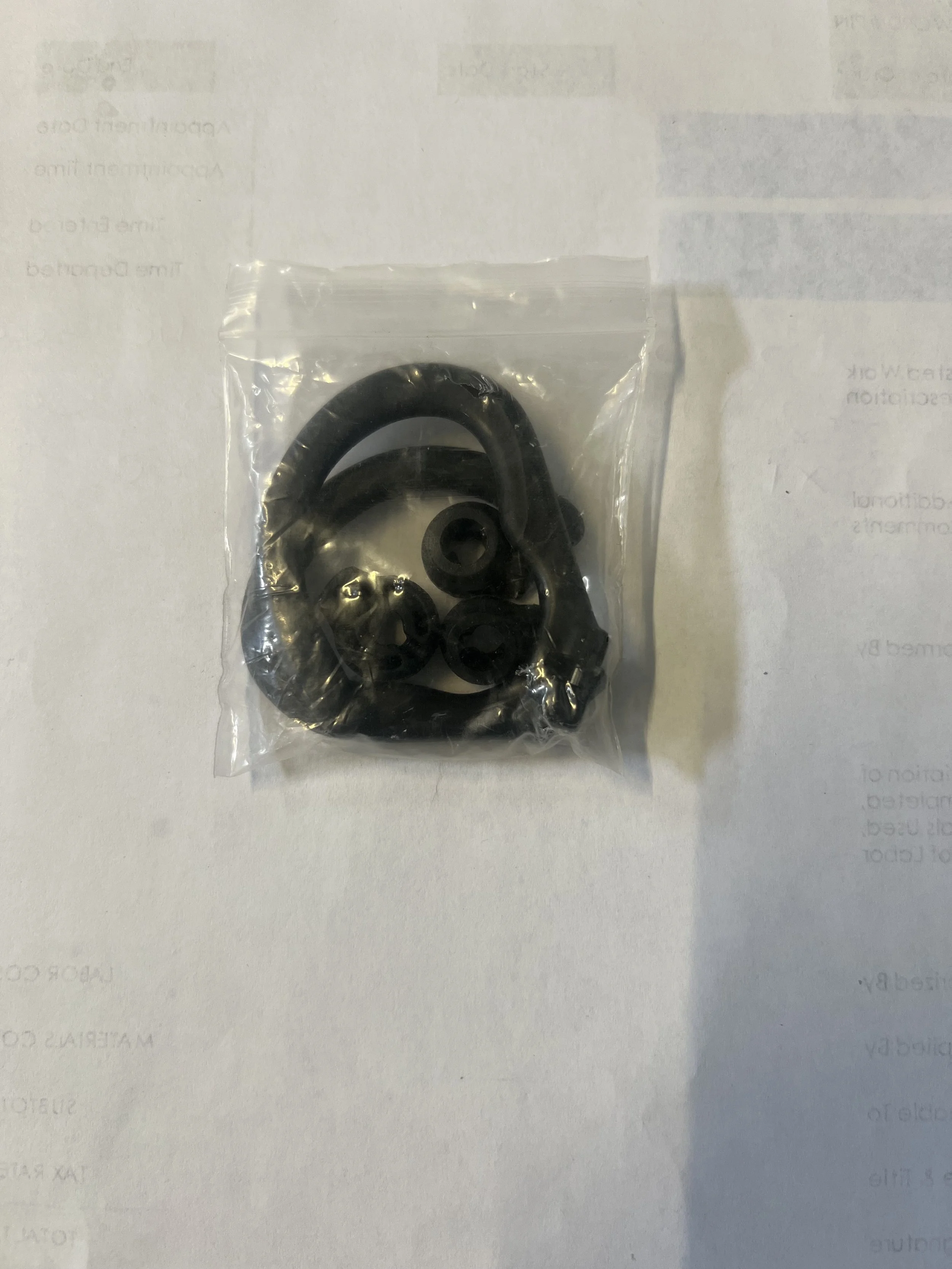 Replacement ear hook repair kit for Powerbeats wireless earbuds.