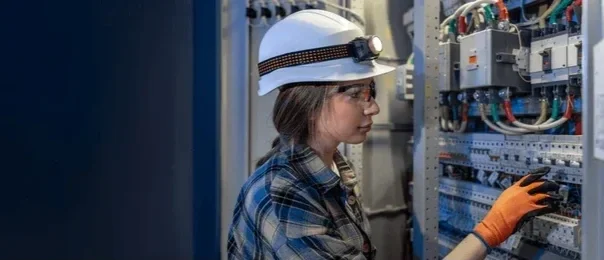 female-electrician-adjusting-electrical-panel-260nw-2753042037.webp