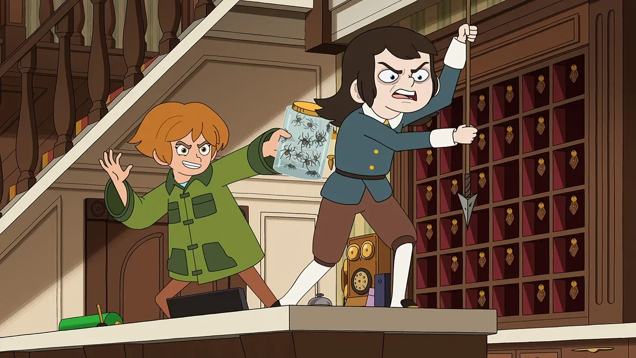 Two animated kids standing behind a haunted hotel reception desk, one holding a jar of spiders and the other holding a spear.