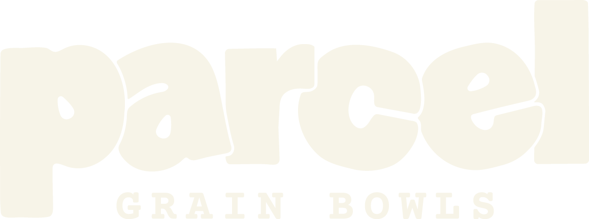 The logo for Pared Grain Bowls with bold, rounded, cream-colored letters on a black background.