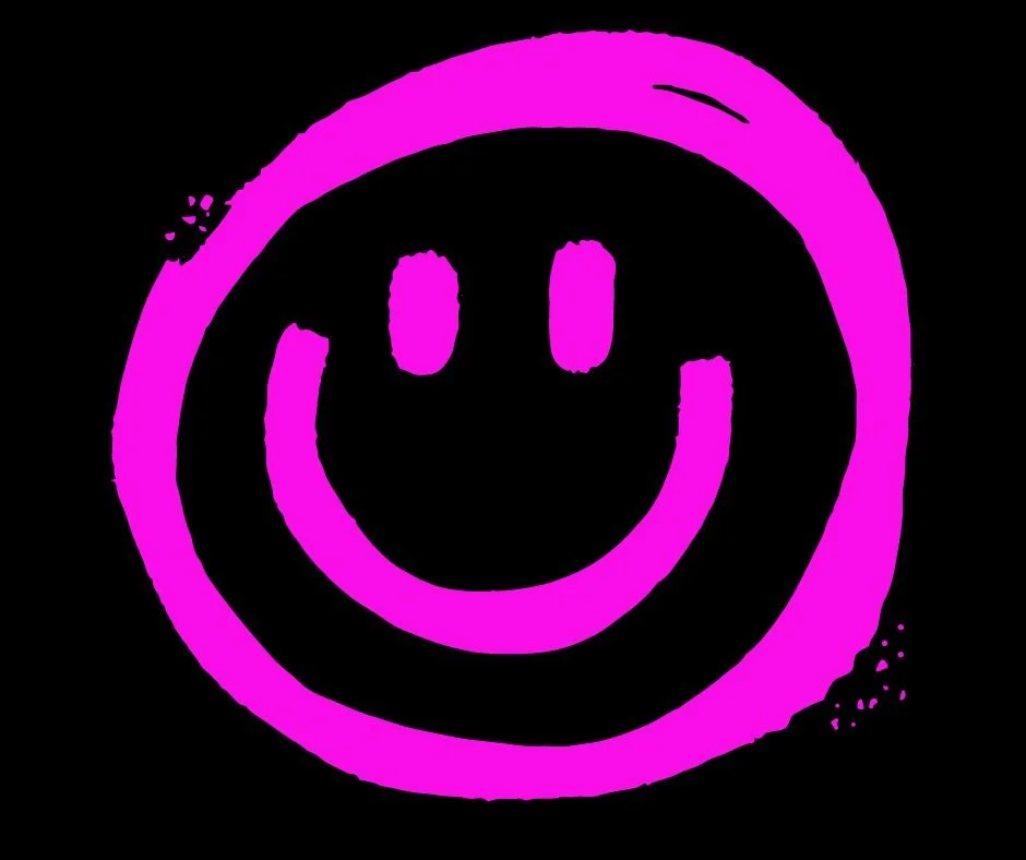 Pink smiley face with two oval eyes and a curved smile on a black background.