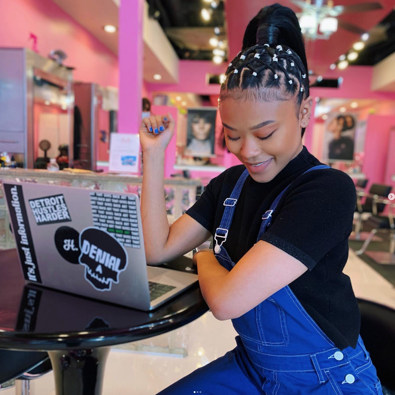 Salon de Weave team member assisting with client service and salon operations in Southfield, Michigan.