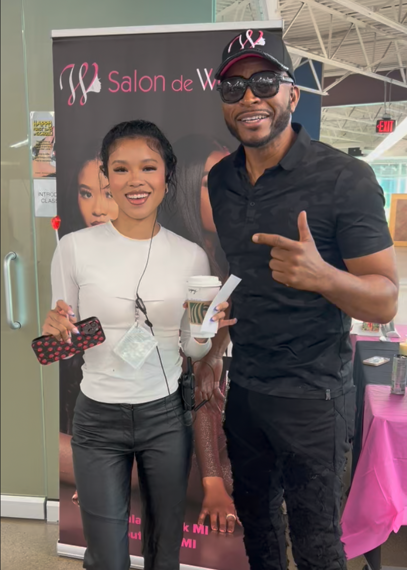 Salon de Weave representatives at a cosmetology career fair in Metro Detroit.