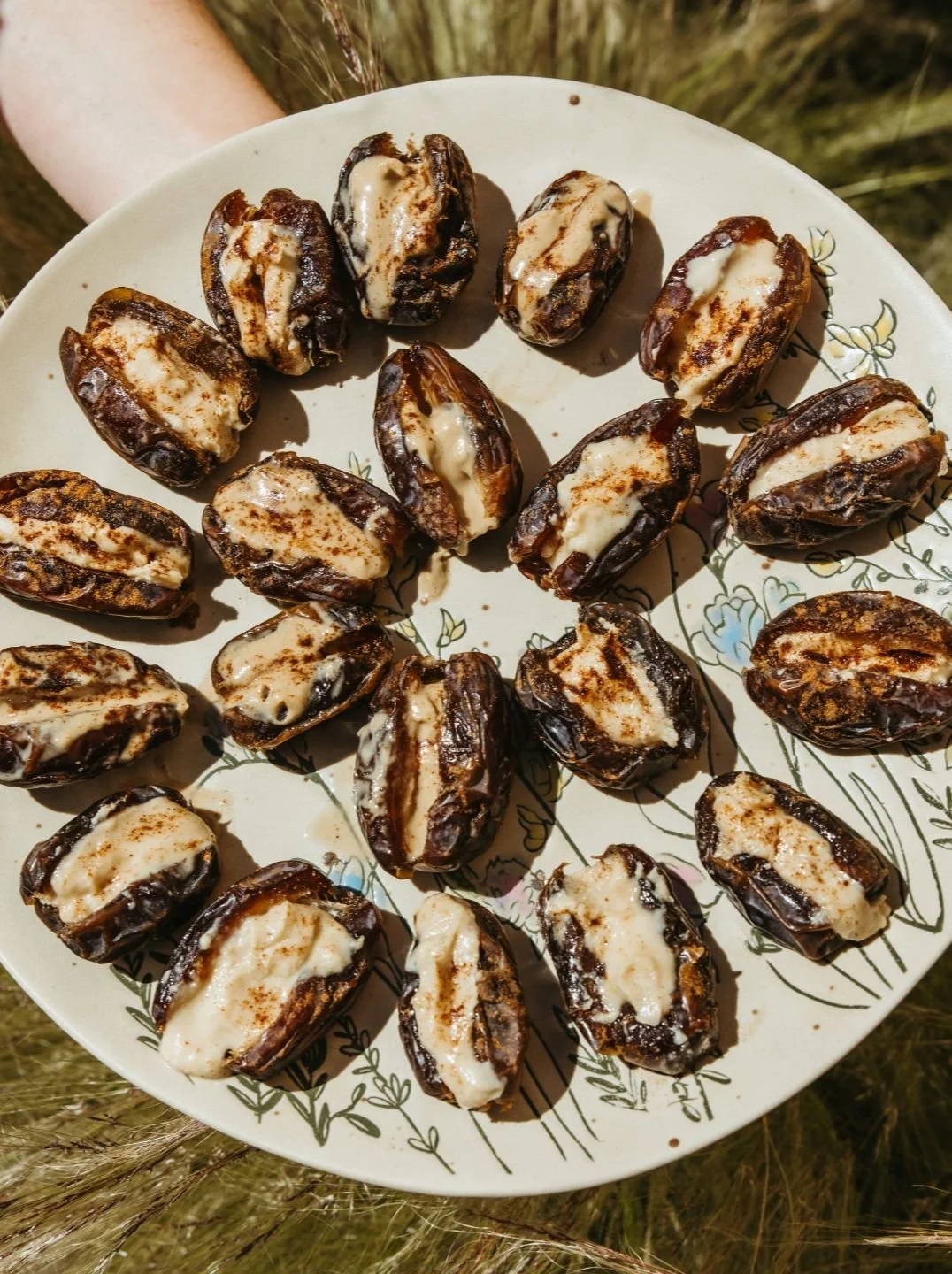 Ayurvedic dates with tahini arranged on a plate