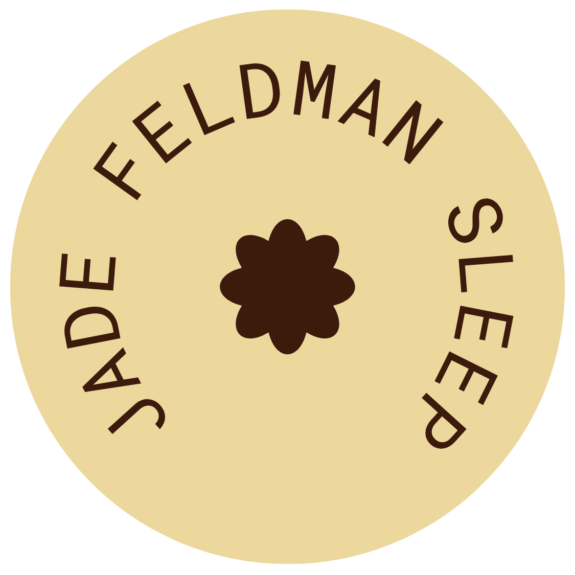 Cream-colored circular label with the words 'Slieded FeldeMan' arranged in a circle around a dark brown flower-like symbol in the center.