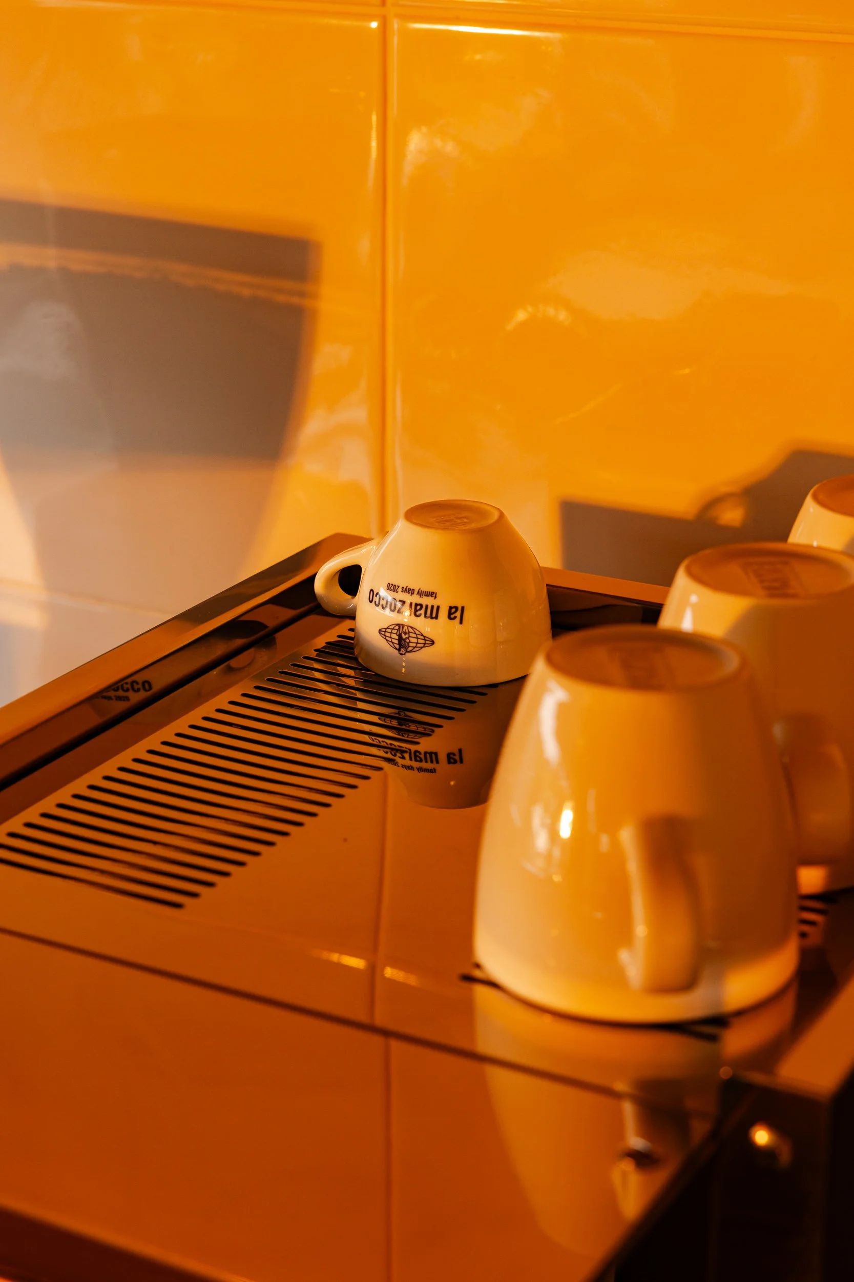 Coffee cup on top of machine