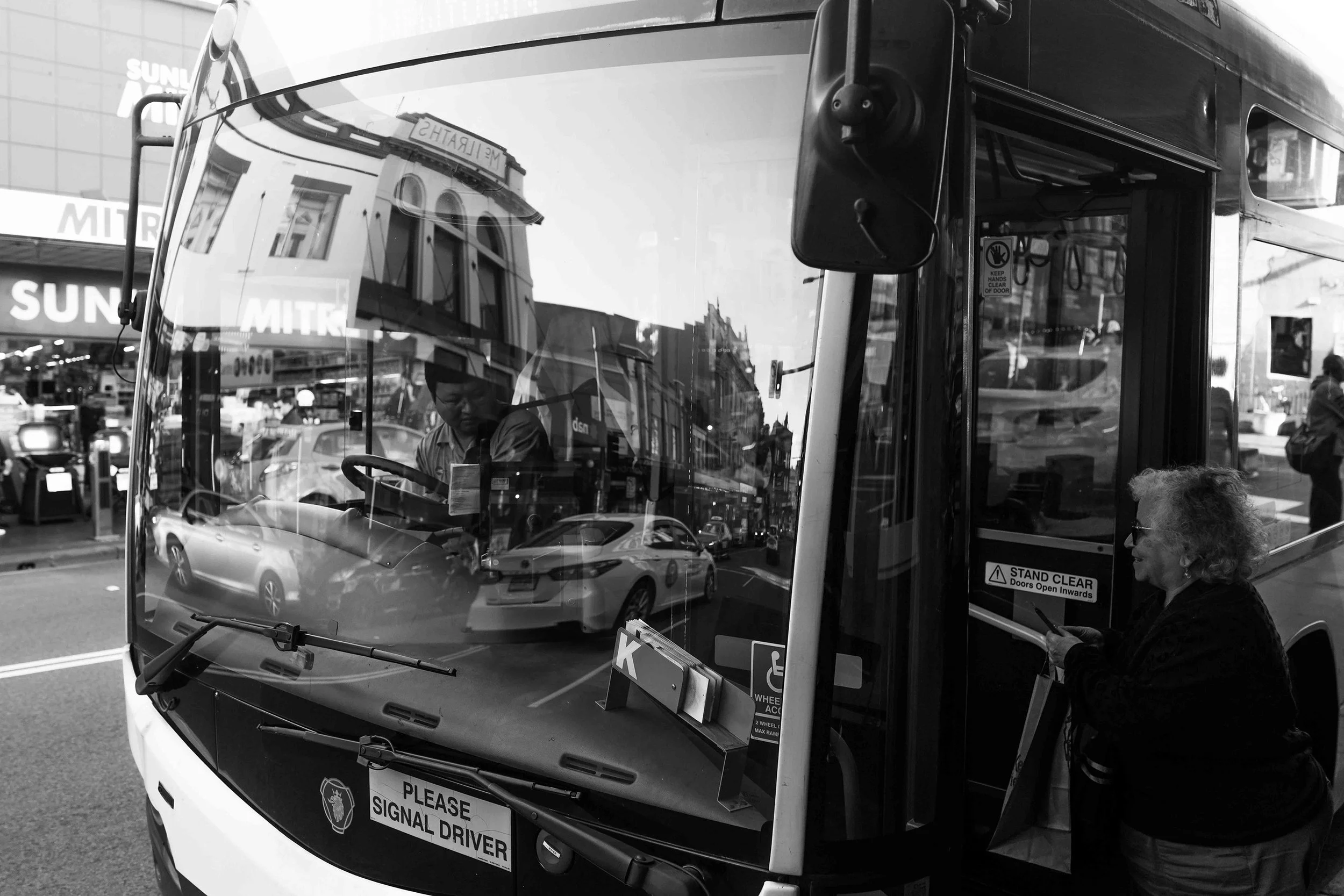 Bus window, King Street Newtown.