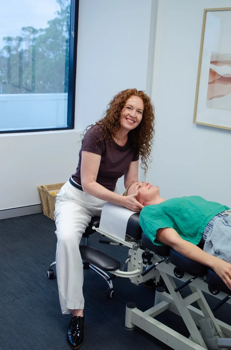 Dr Di Bacic providing chiropractic care