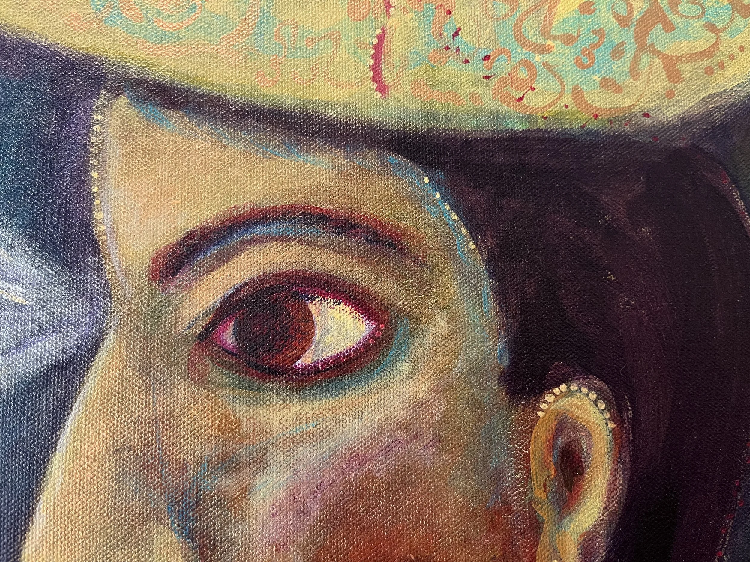 Close-up of a colorful abstract painting close up of a woman's profile with swirling patterns, vibrant colors, and visible textured brushstrokes.