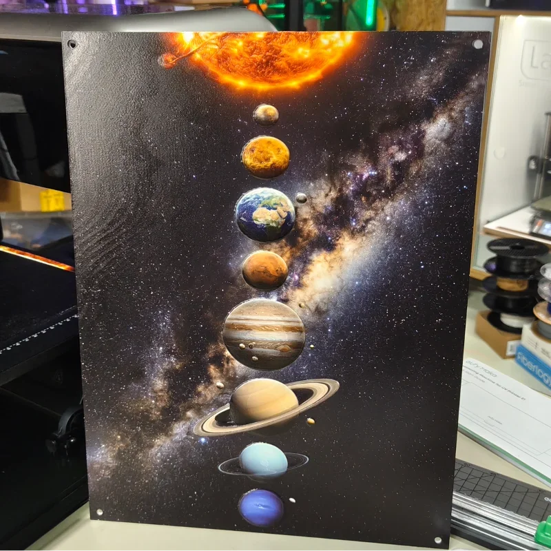 A poster of the planets of the solar system arranged vertically against a backdrop of outer space with stars and a galaxy.