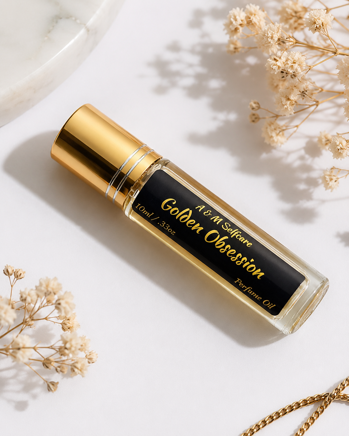 Golden Obsession–Peach, Dark Patchouli & Black Rum