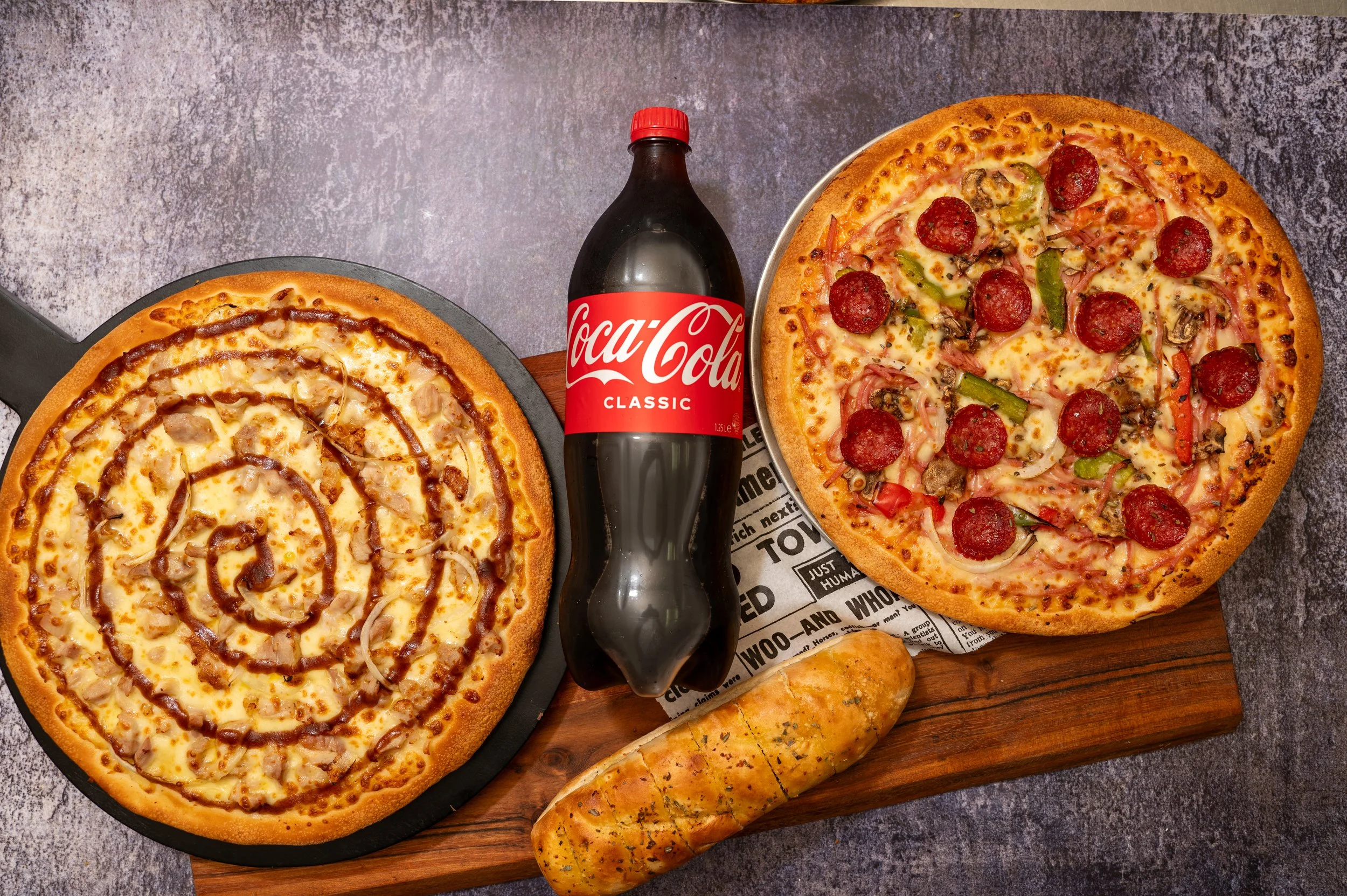 20240221_deal_2_largepizza_coke1.25_garlicbread (1 of 3).JPG