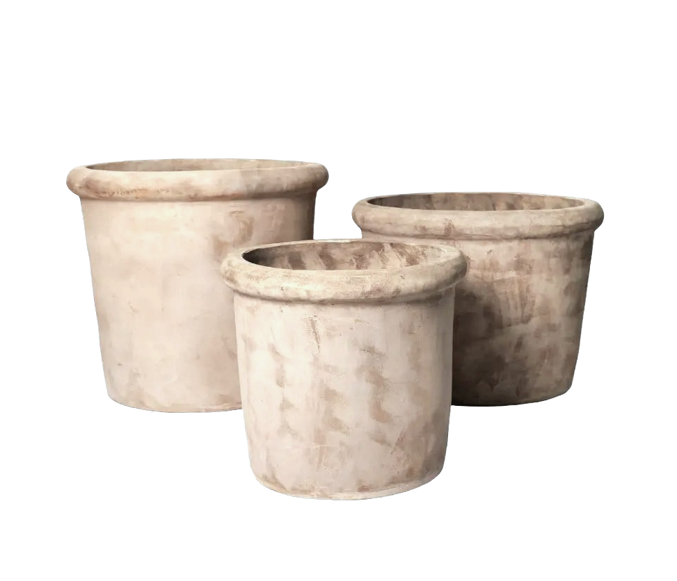 Three empty stone flower pots of varying sizes, with weathered surfaces.