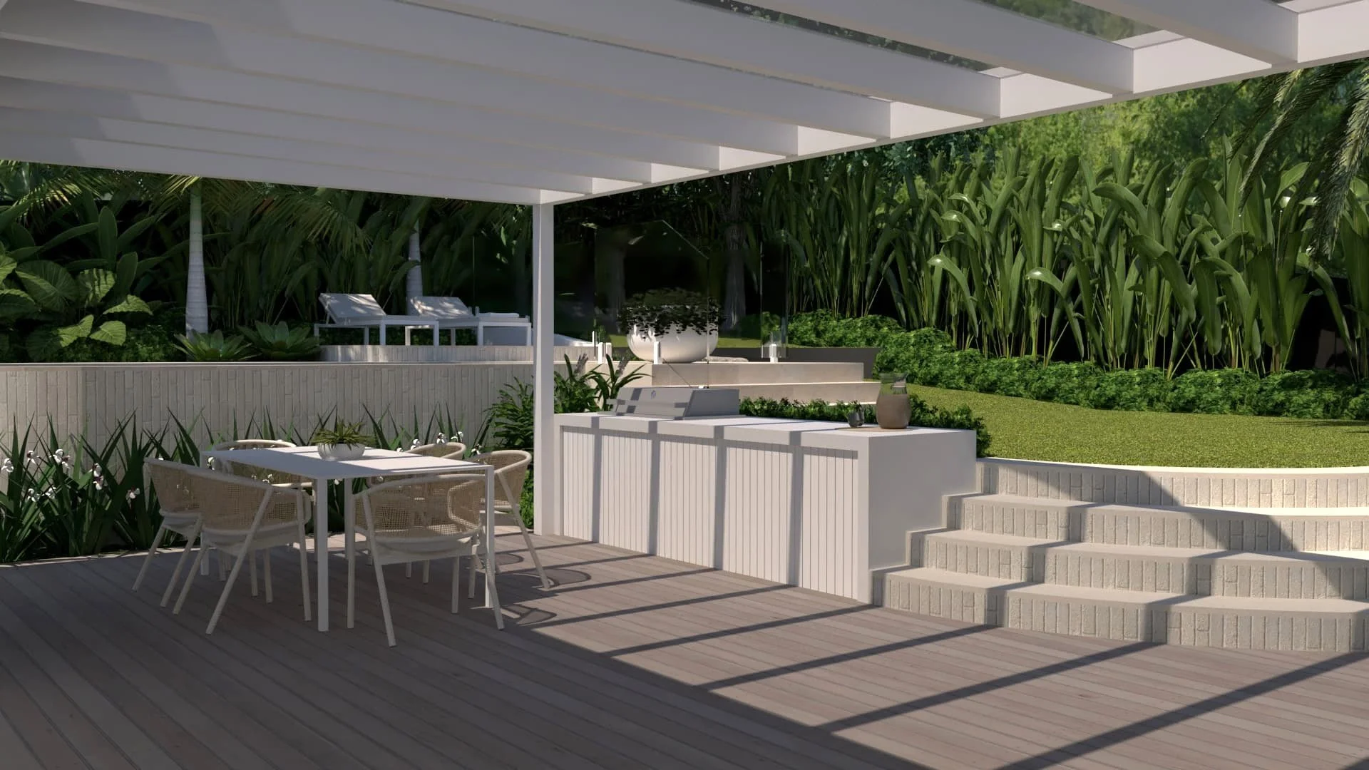 Modern outdoor patio area with white furniture, dining table, and chairs, surrounded by lush green plants and trees, with steps leading to a garden area.