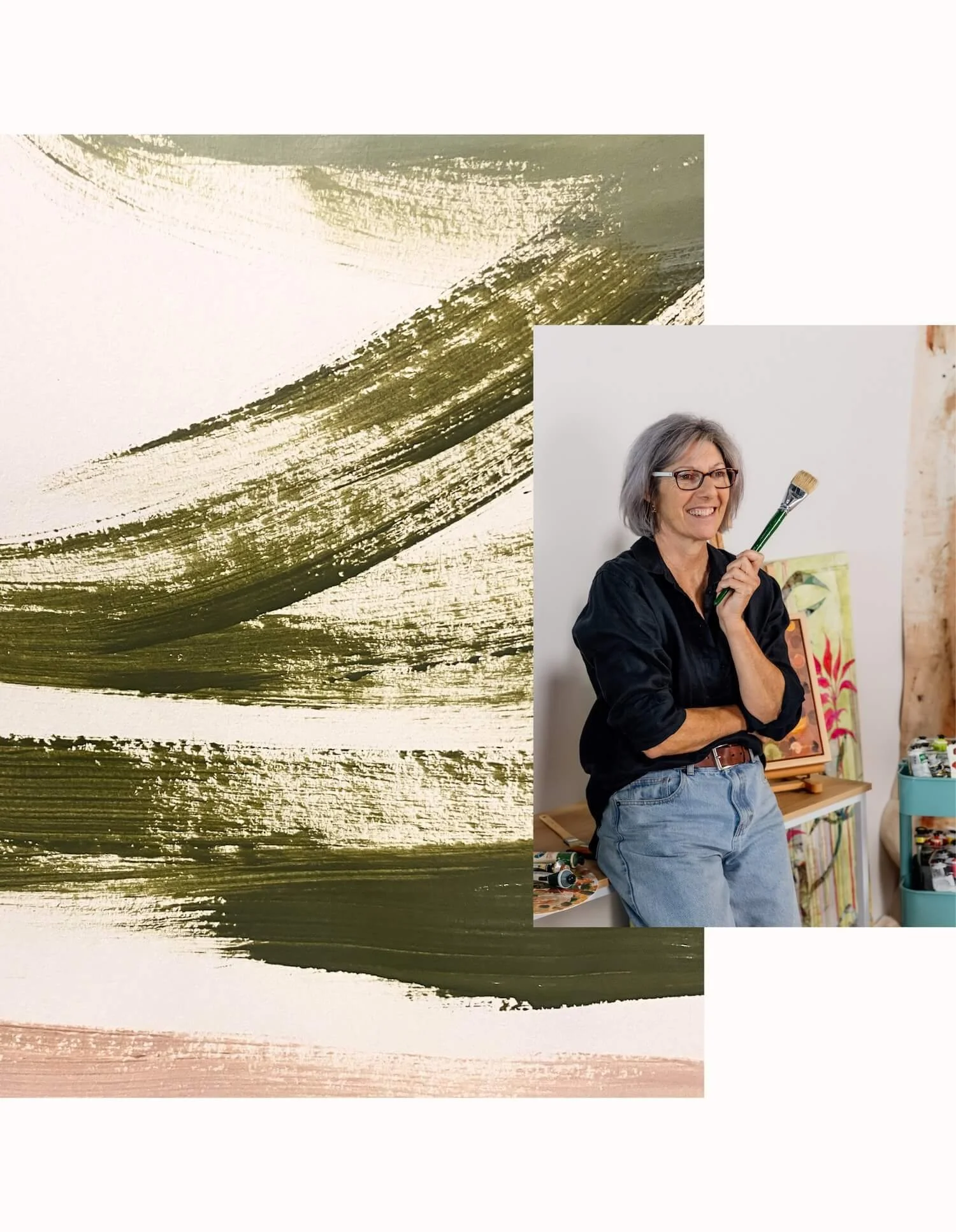 Artist Kaz Hughes, standing in an art studio next to a colorful painting and art supplies.
