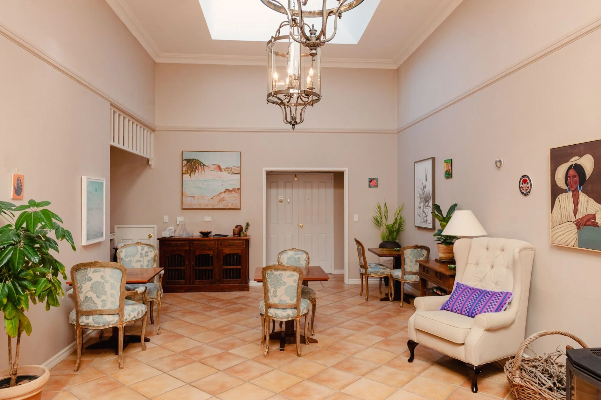 Boutique Dunsborough accommodation with private guest suites and cozy shared guest lounge with fireplace.