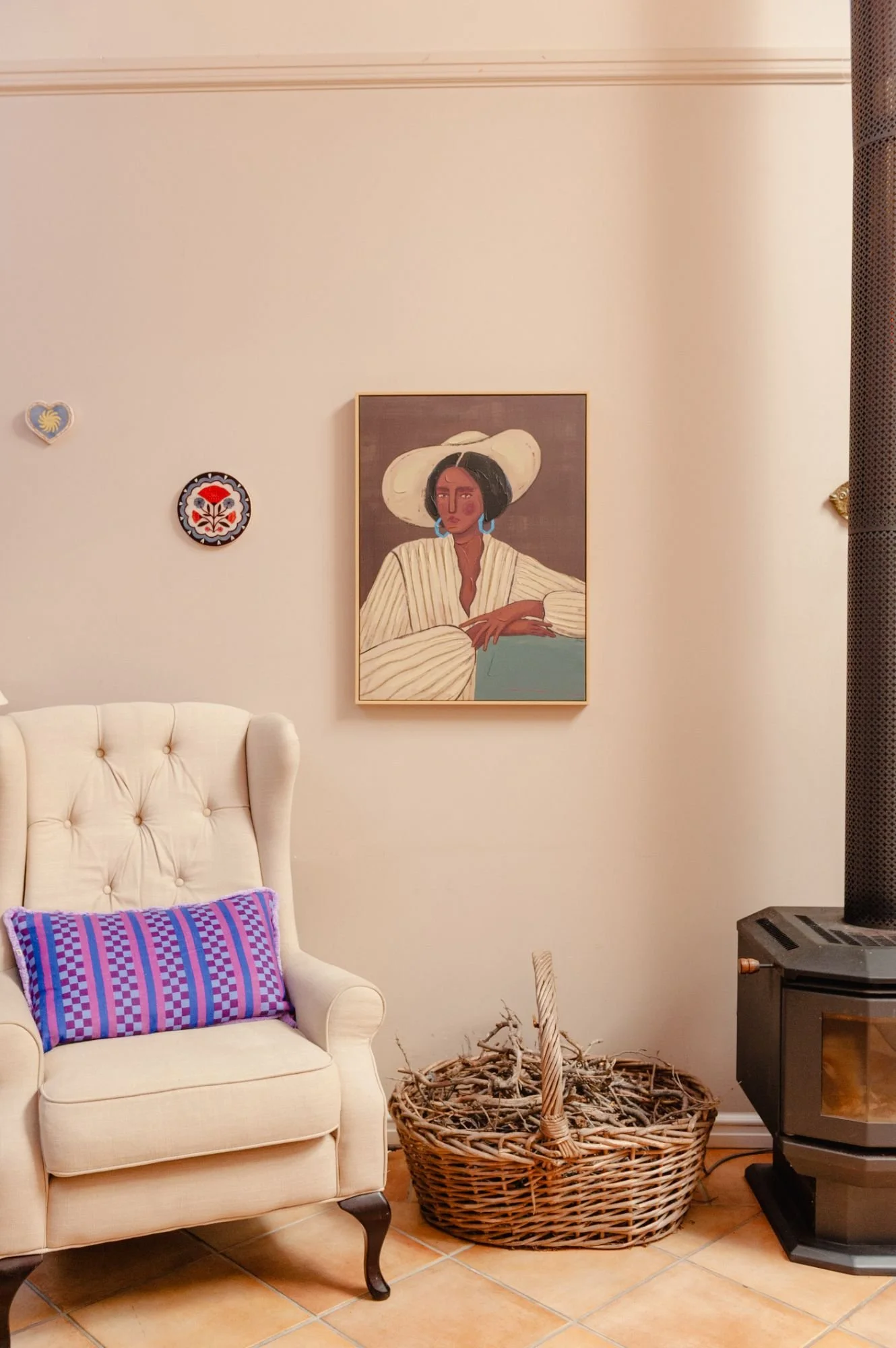 Beautifully decorated guest lounge with fireplace at Lanterns Retreat