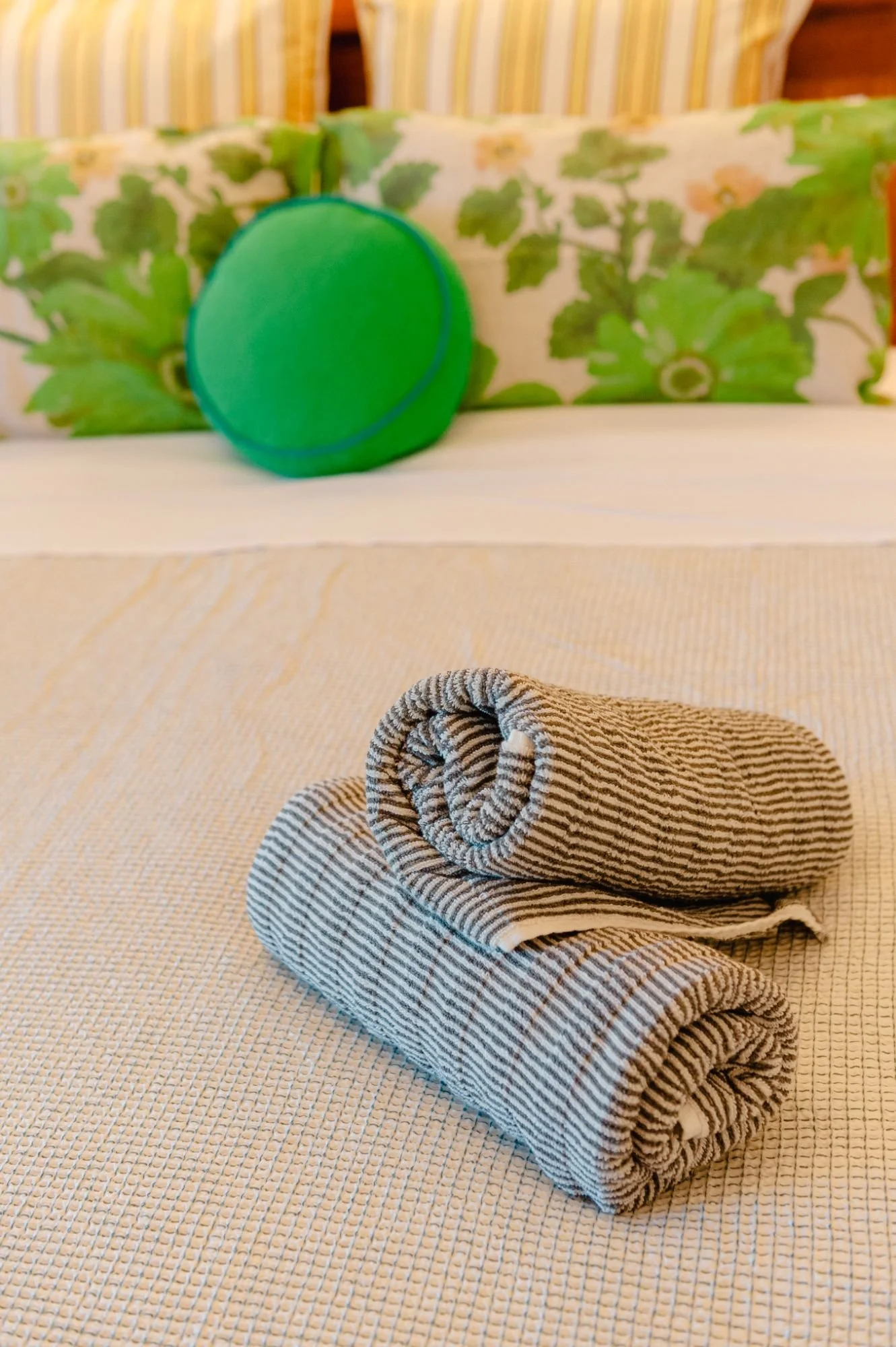 Marchant Suite bed with towels at Lanterns Retreat
