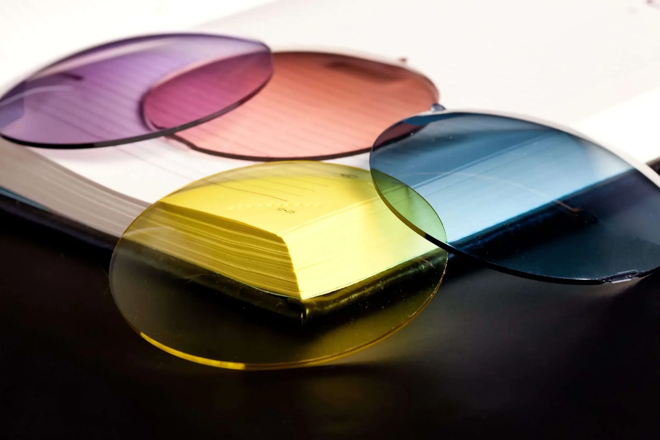Tints can then be incorporated into prescription or non-prescription spectacle lenses.