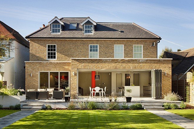 aluminium_folding_sliding_doors_the_sfk70_system_installed_at_a_georgian_style_home_in_esher_surrey.jpg