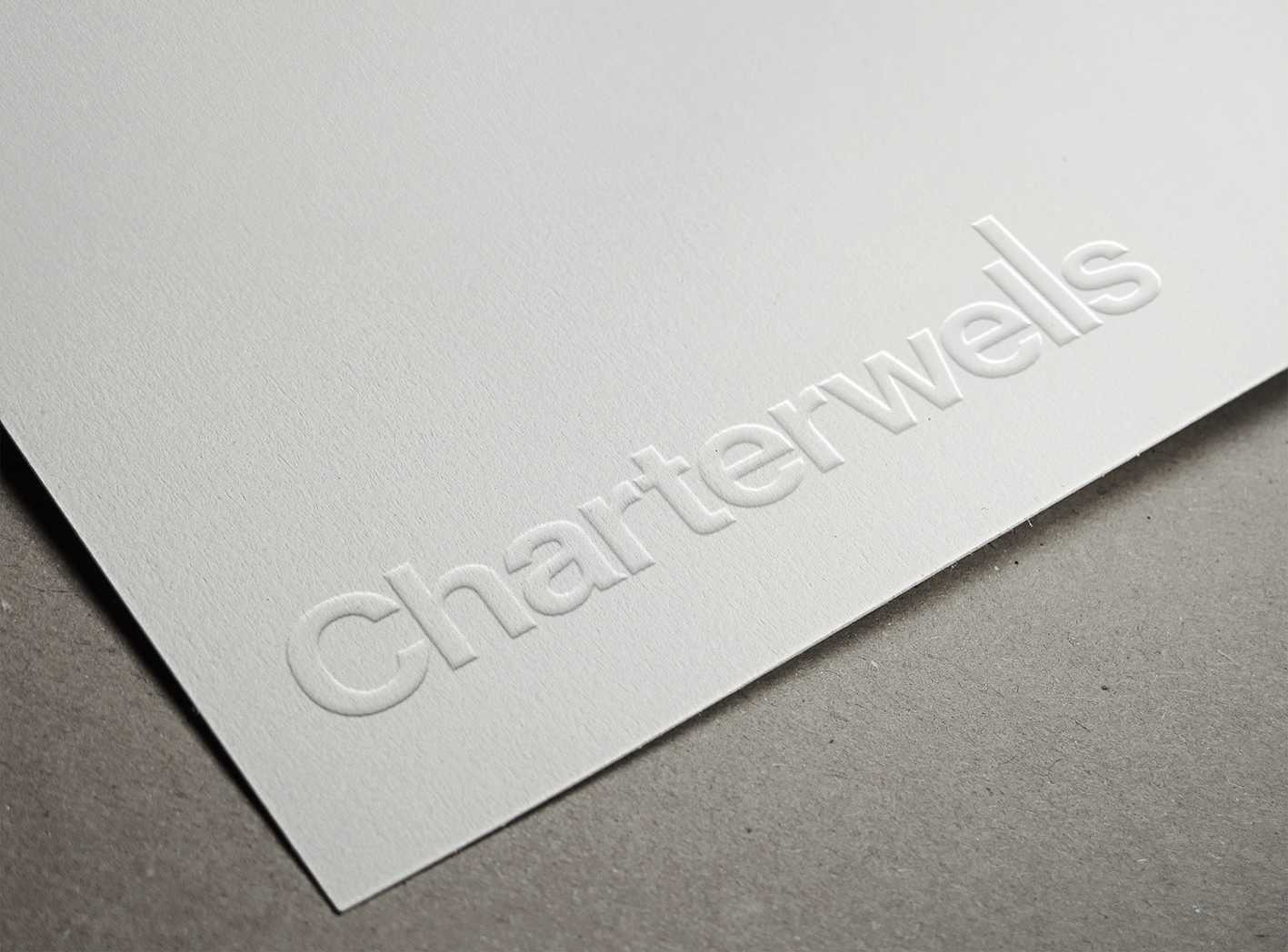 Embossed Paper Logo MockUp.png