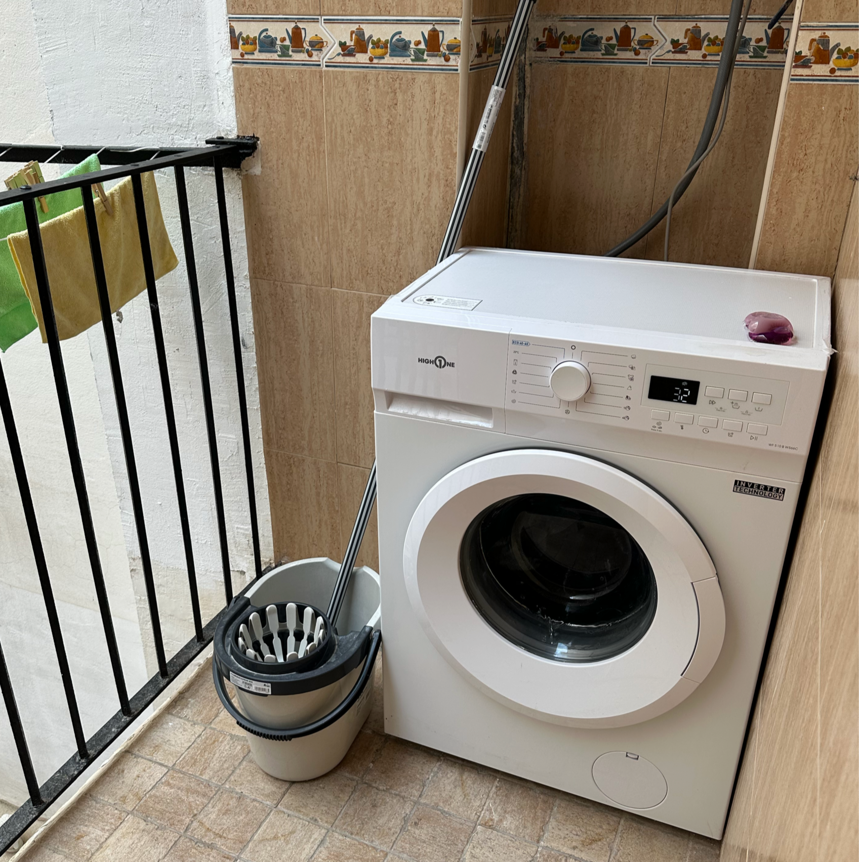 One big adjustment has been how we do our laundry. Washing machines are a lot smaller, and dryers are not common. Our washing machine at this apartment was outside on a little balcony off the back.