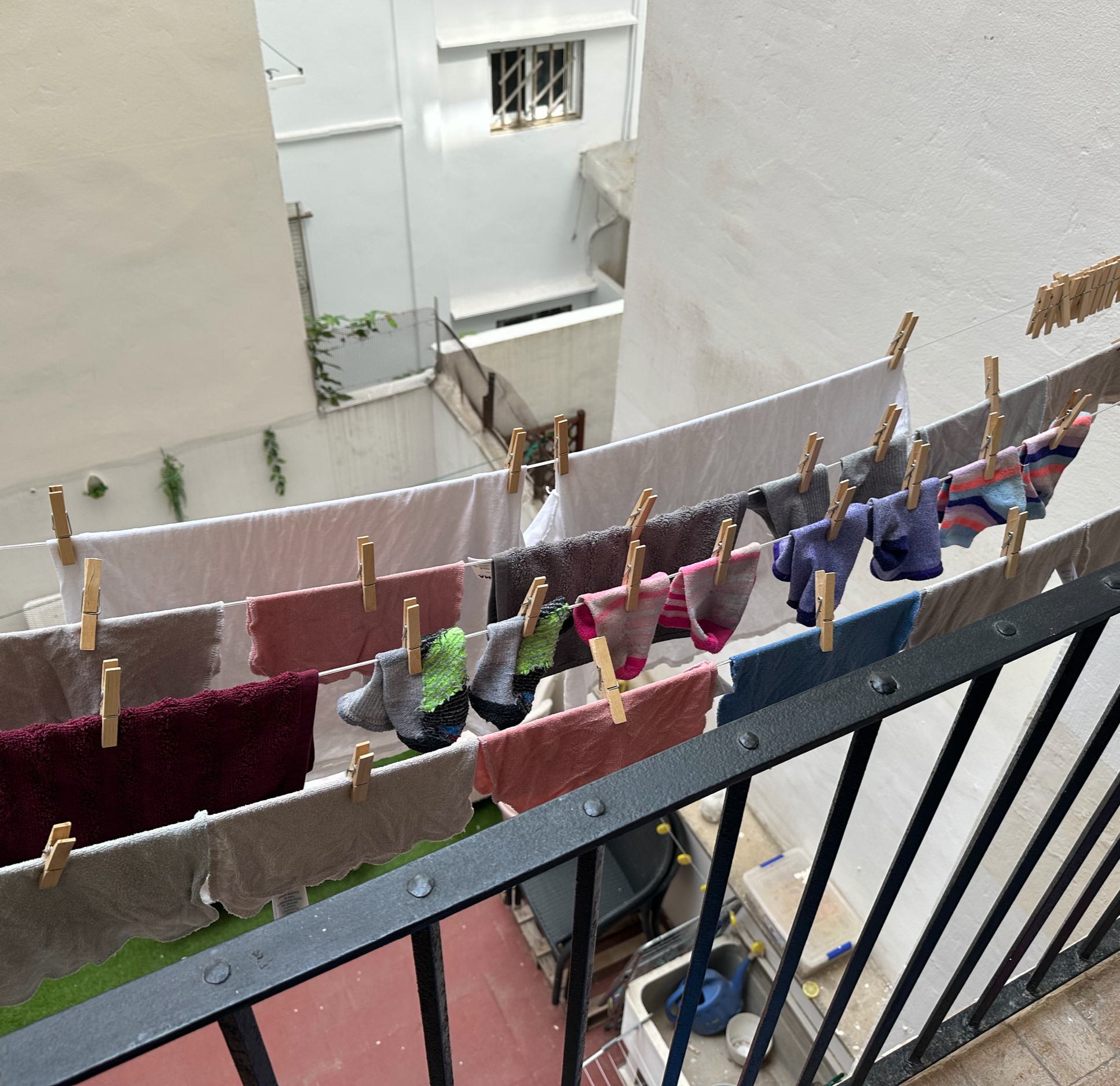 We did pretty well with hanging the laundry to dry off outside our back patio.  Rachel only lost one sock to the patio below! :)