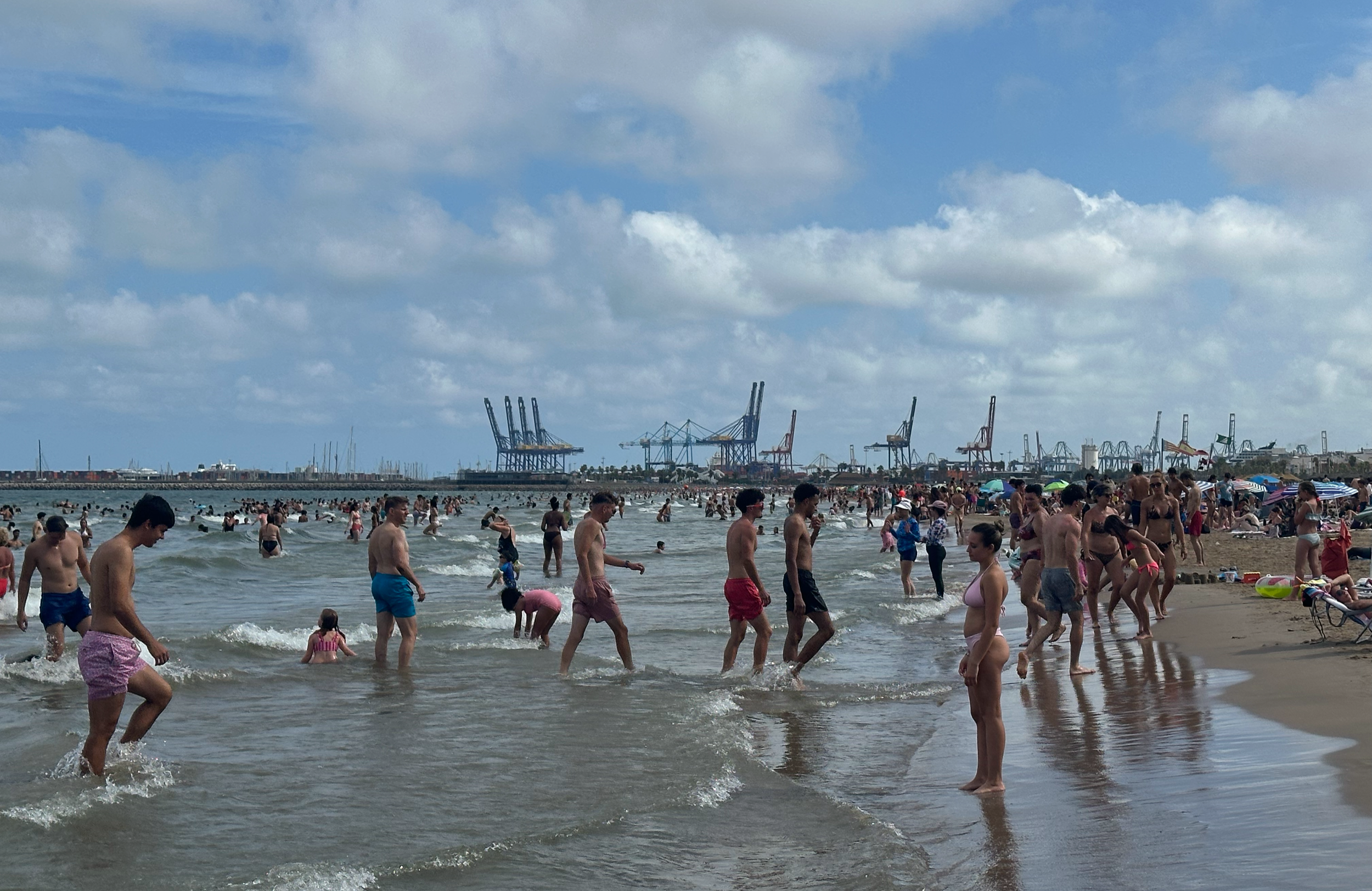 When you look to the right down the beach, you can see the Port of Valencia...