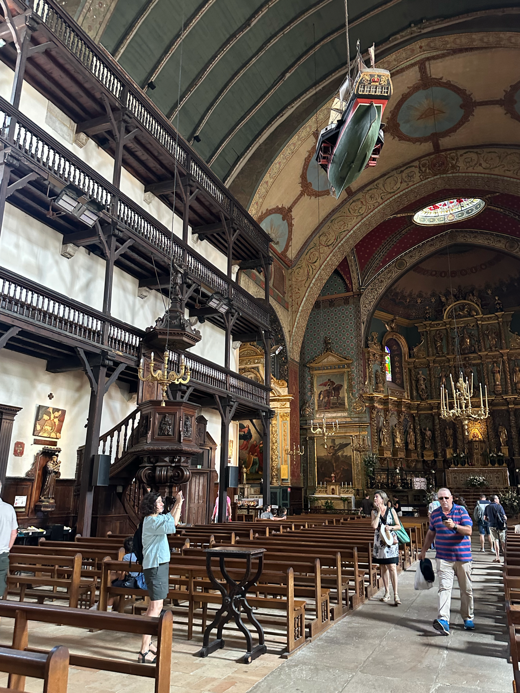 The church was very dark inside and curiously decorated with hanging boats!
