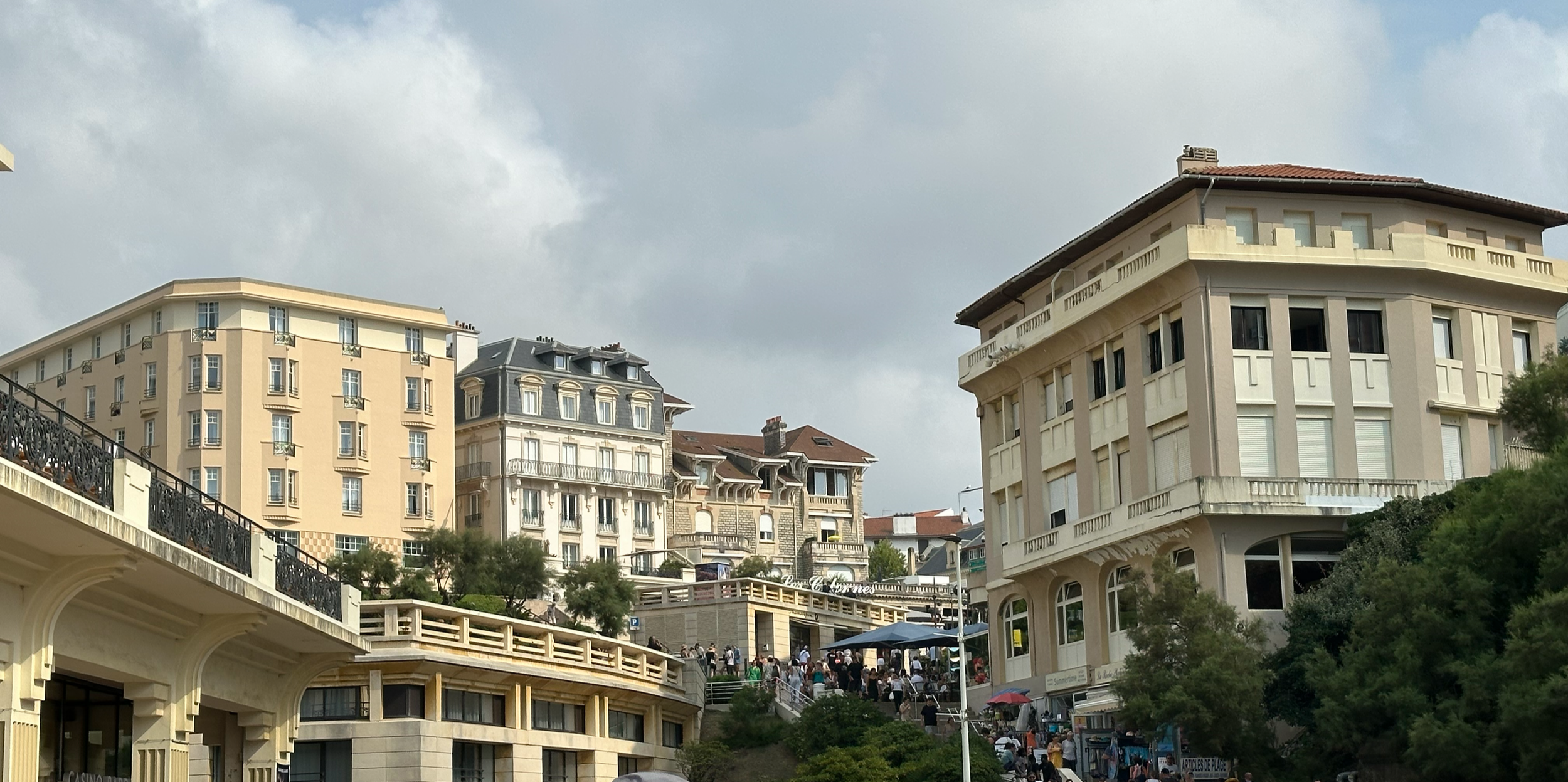 Looking back up from the beach, the buildings are striking.  High-end shopping and strangely enough, a large casino.