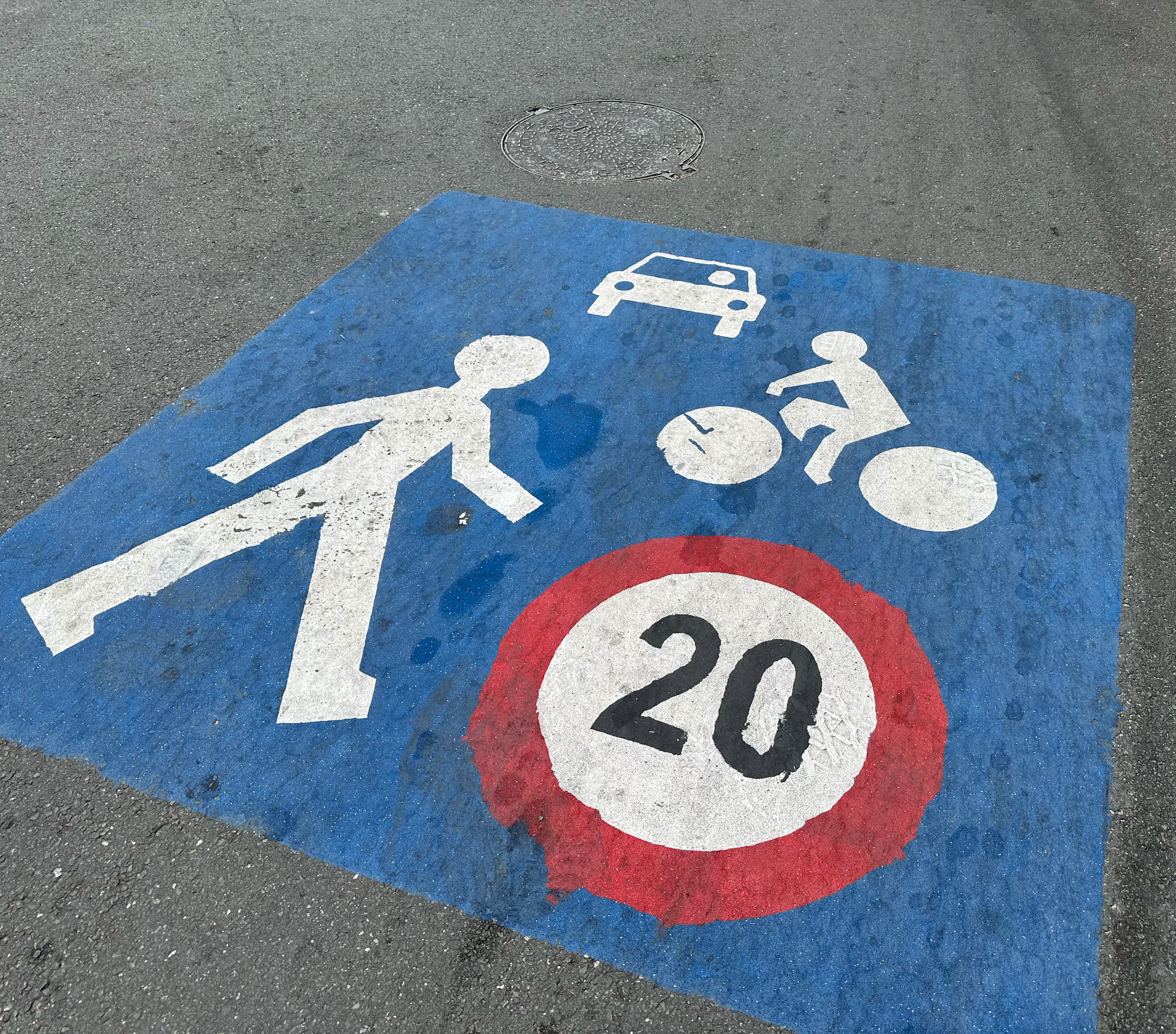 We all cracked up at this sign painted on the road.  The lane is for pedestrians, bicycles, and motorists! Talk about having to watch out for traffic around you!