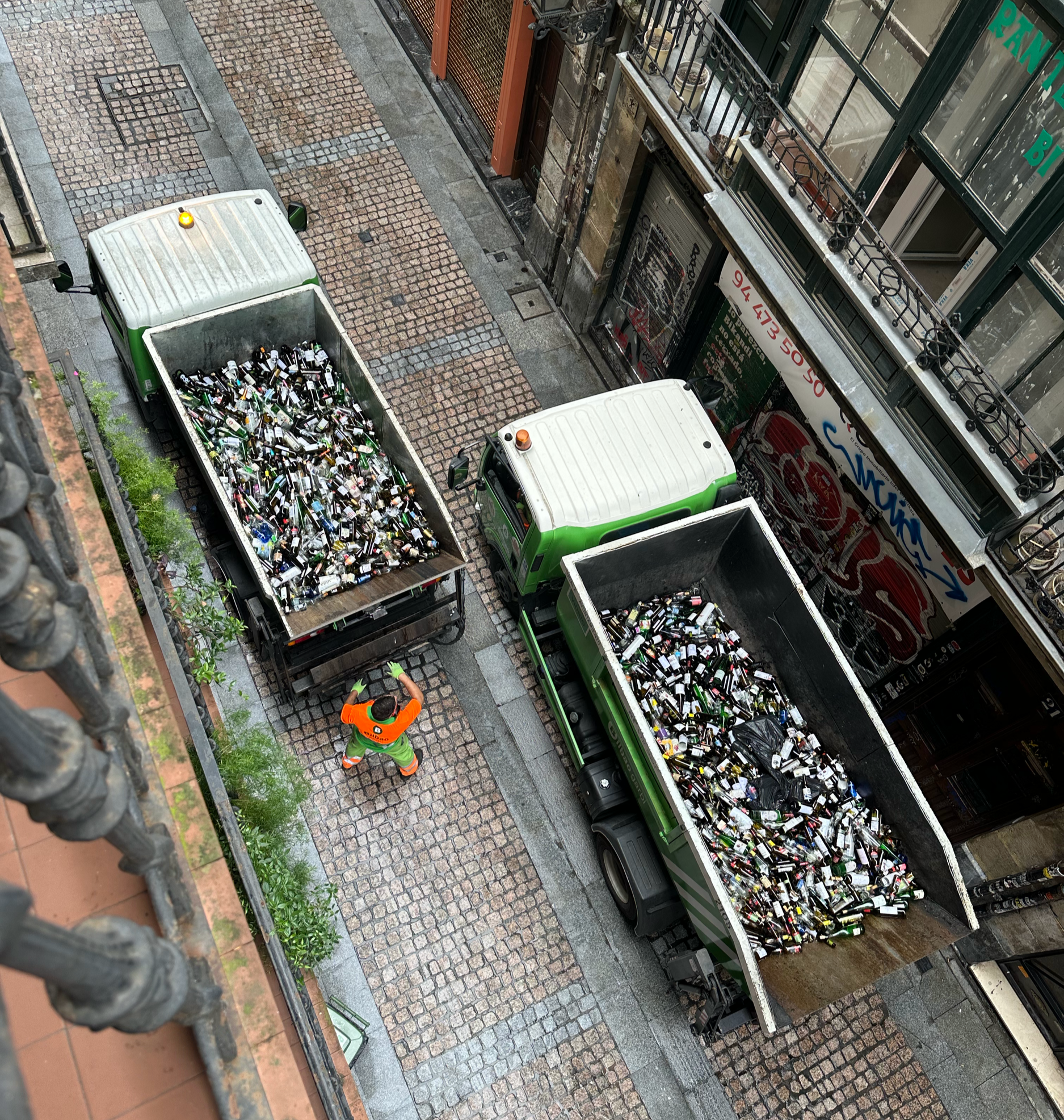 Our apartment balcony was over a street full of bars.  After late Saturday night reveling, the Sunday morning glass recycling was intense!