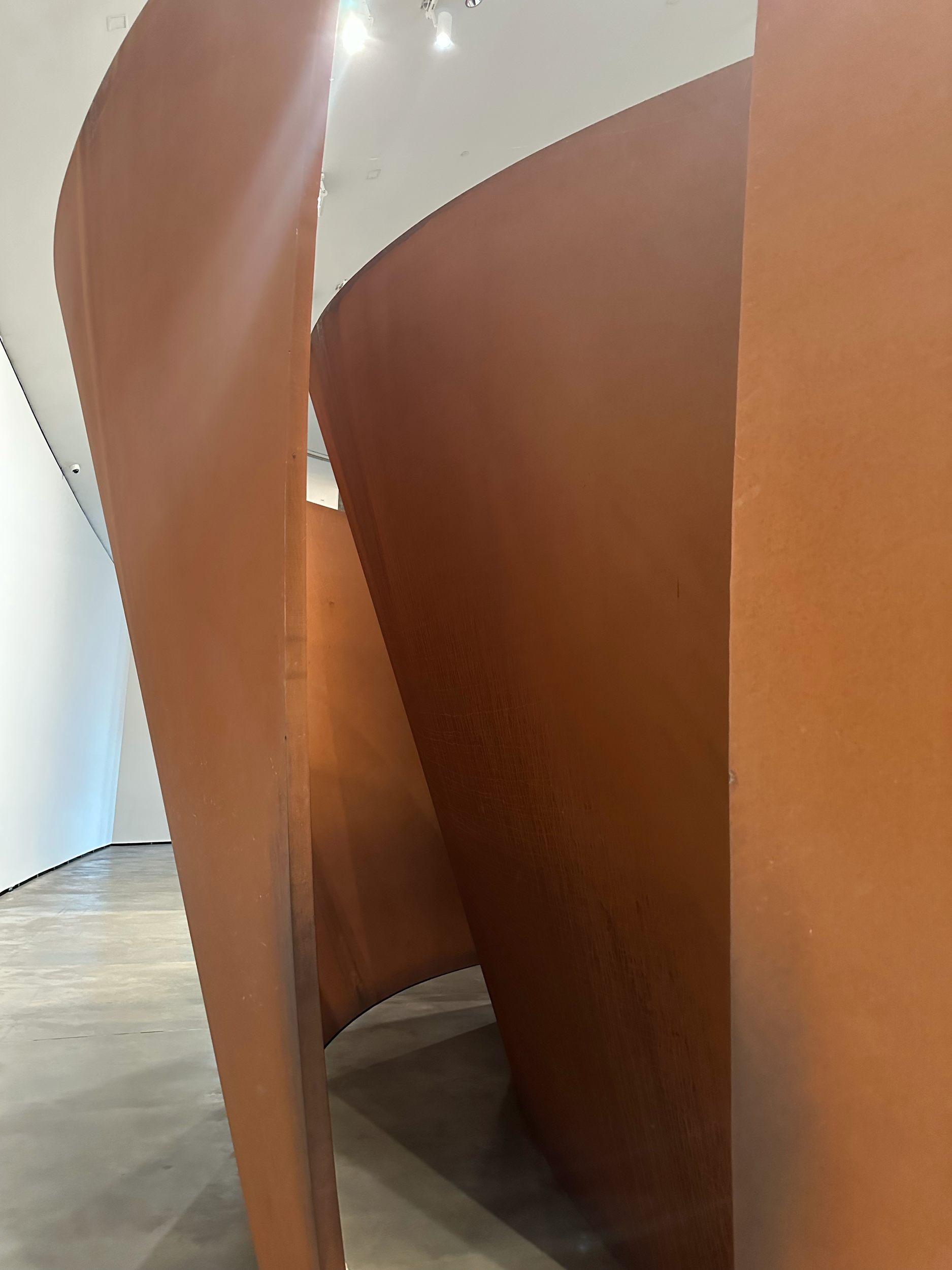 "Torqued Spiral" was made of 7 large pieces of weathering steel that tilted toward each other and then away from each other.