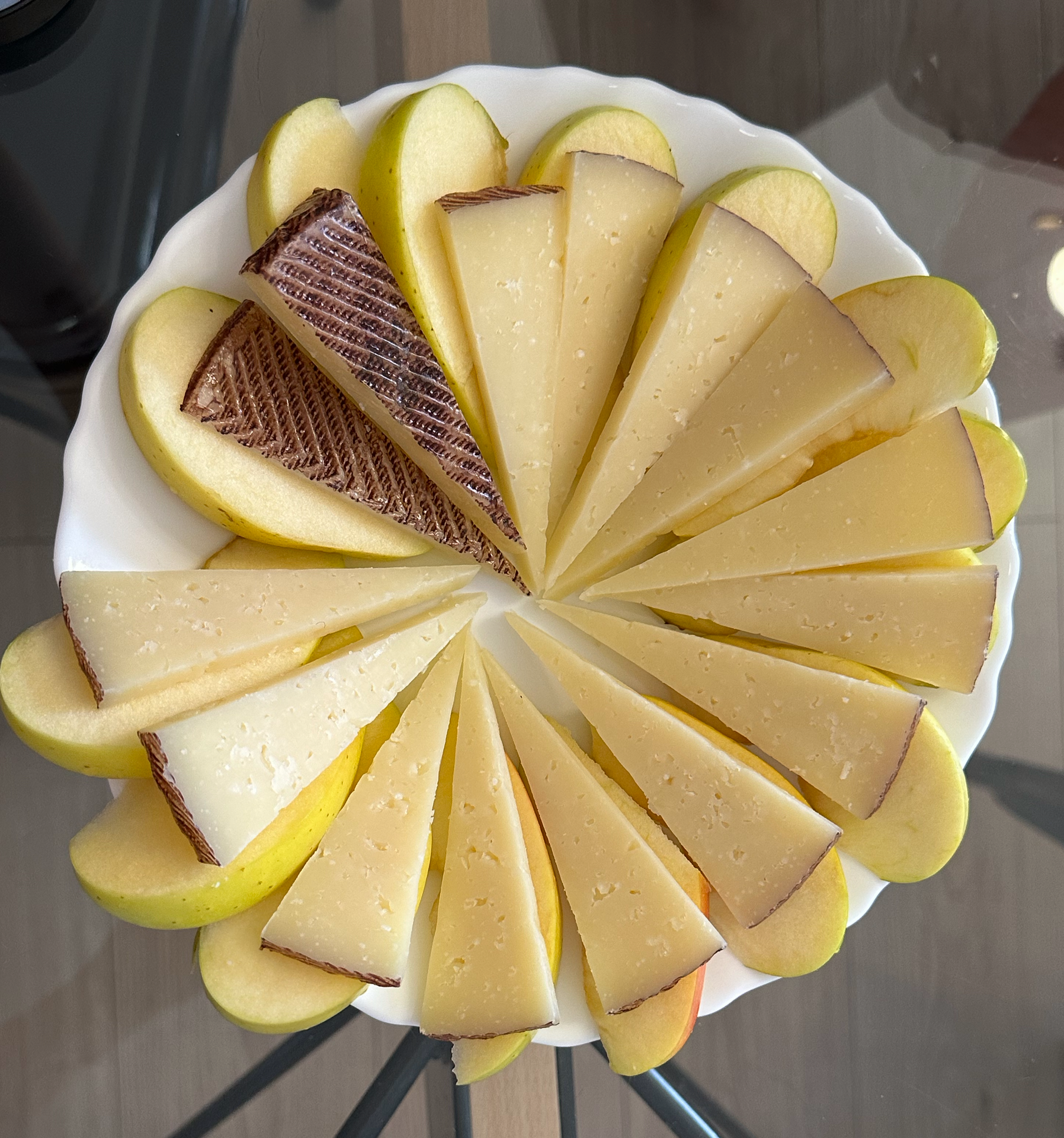 One of our favorite snacks has become golden delicious apples and manchego cheese.  The kids enjoyed making fun patterns out of them.  