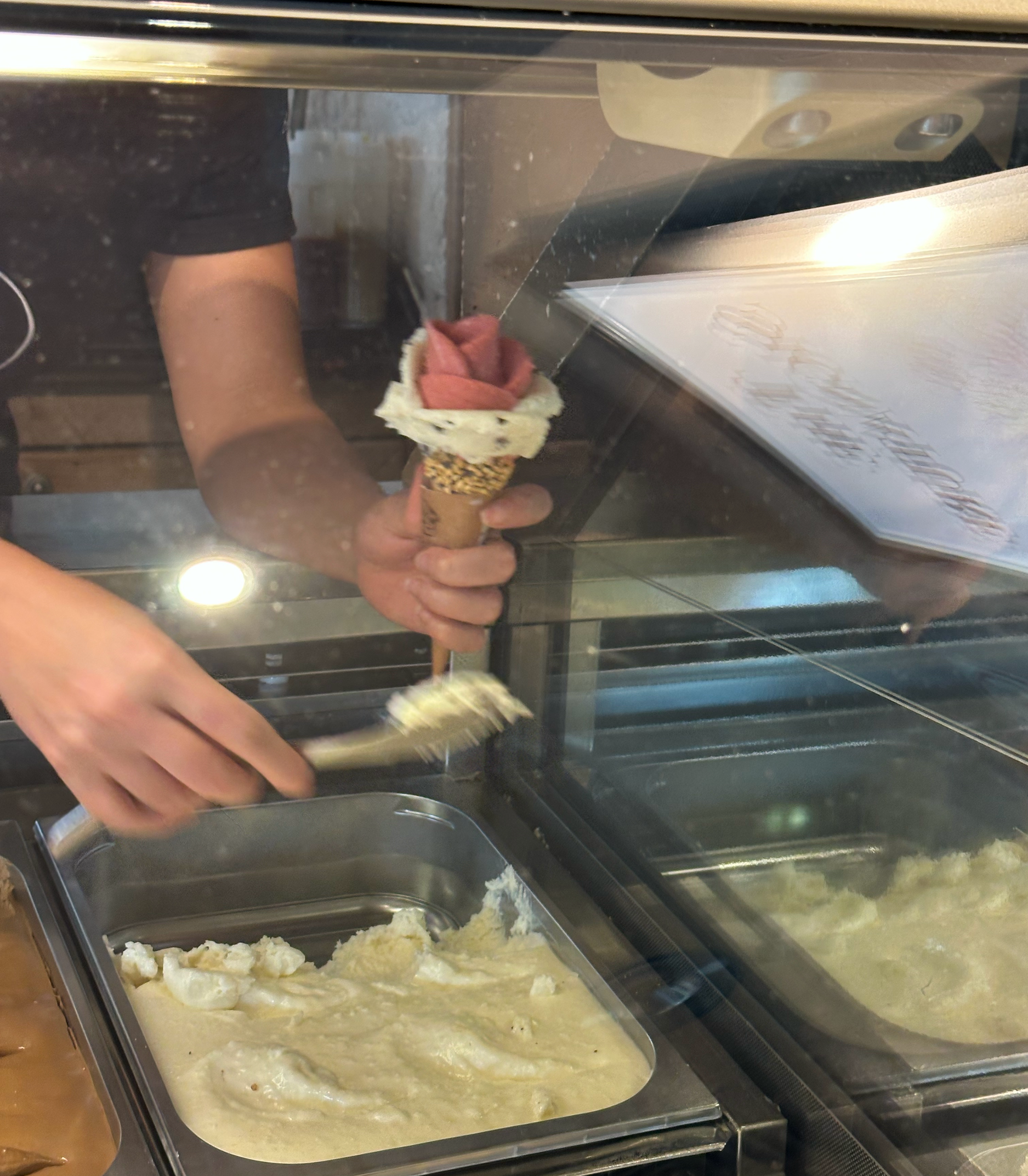 It was amazing to watch as they created "The Signature" cone.  You can pick as many flavors as you want, and they create a flower.  