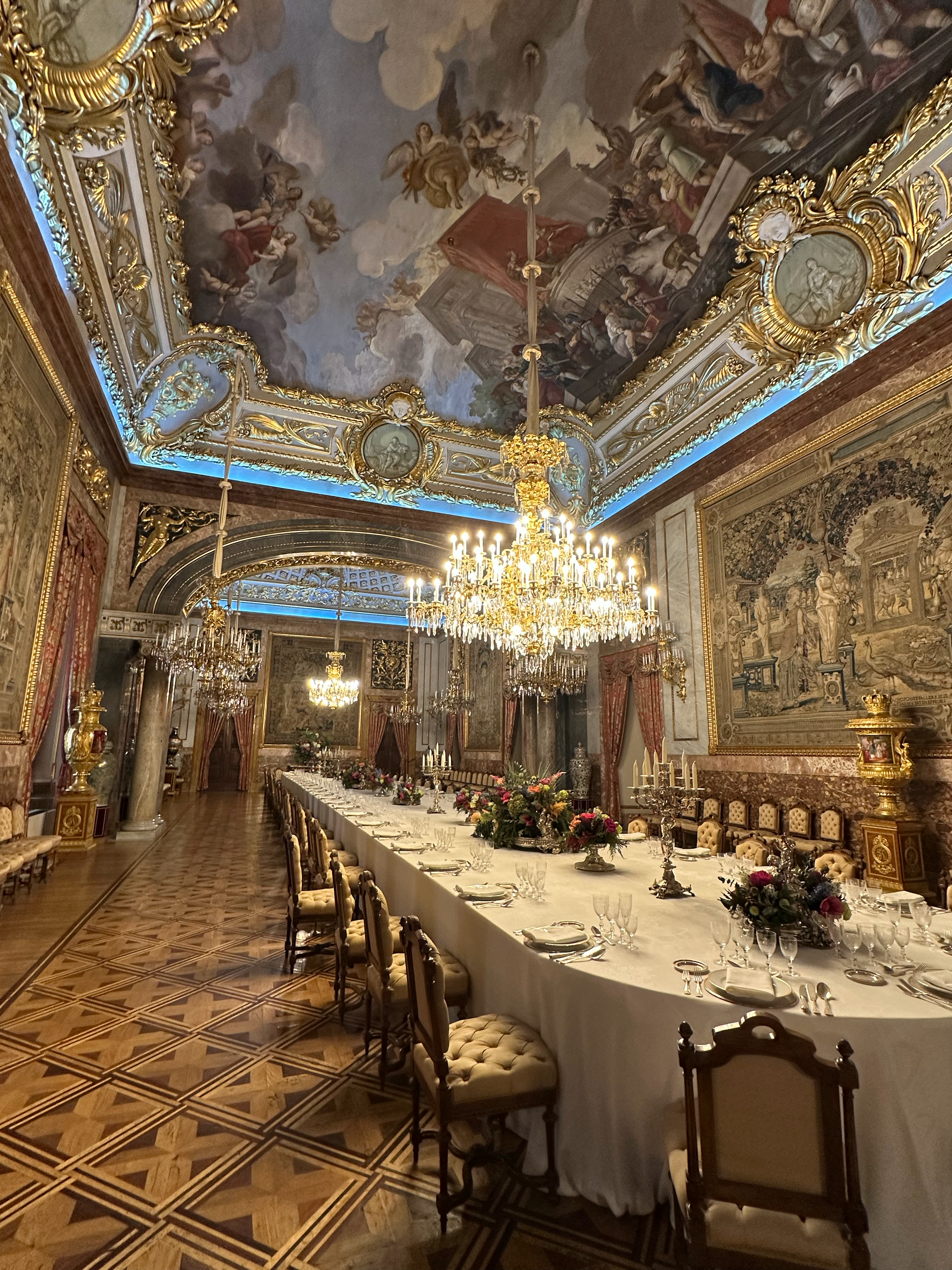 The dining room was magnificent.  One thing to note- the fourth chair that is pulled out a little further than the rest is where the King sits at a royal dinner, and the Queen sits across from him.  