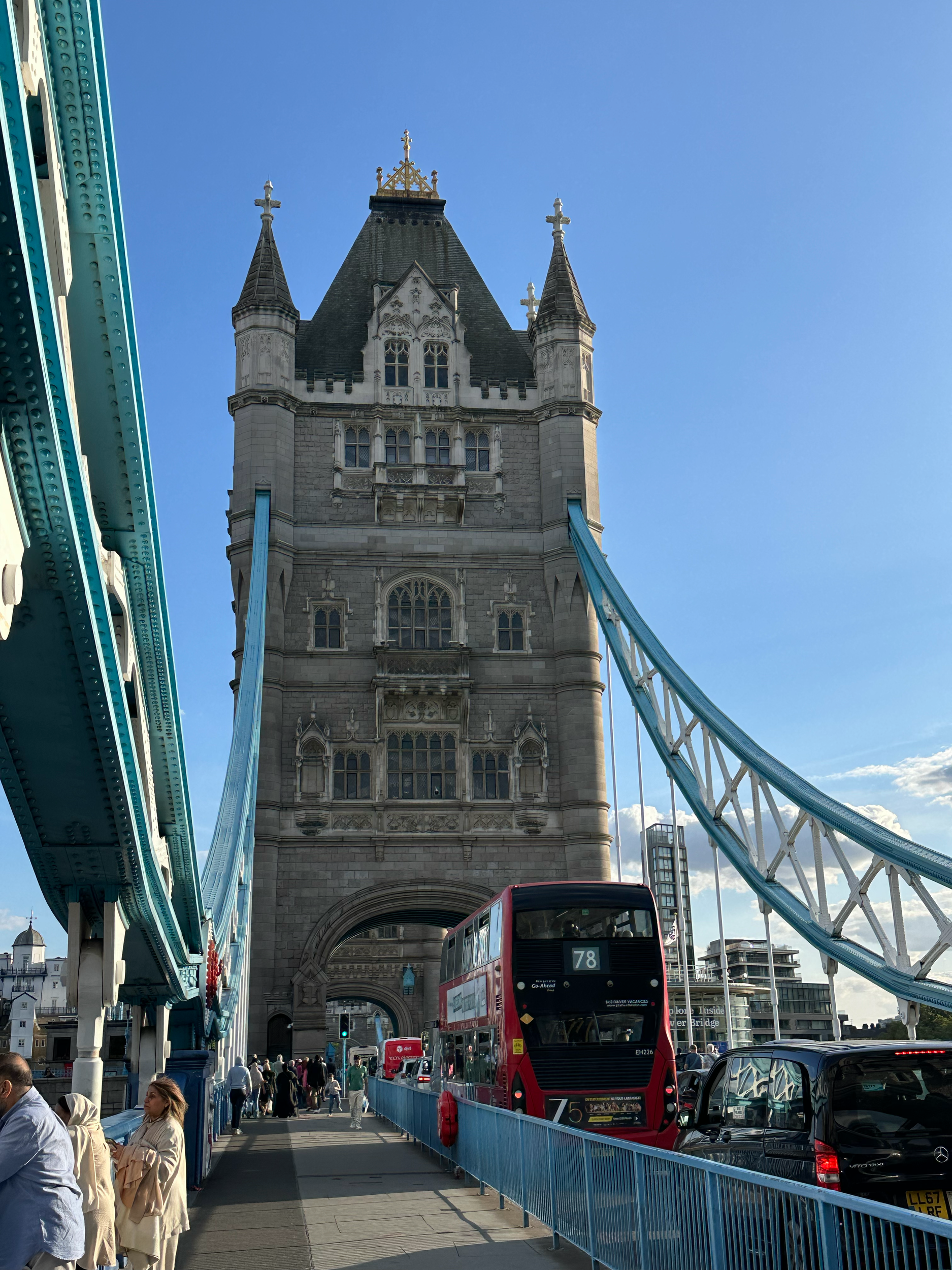The current gothic design was built from 1886-1894.  The bridge is a combination bascule and suspension bridge, allowing ships to pass through, ease traffic congestion, and with a high-level walkway allowing for additional pedestrian traffic.