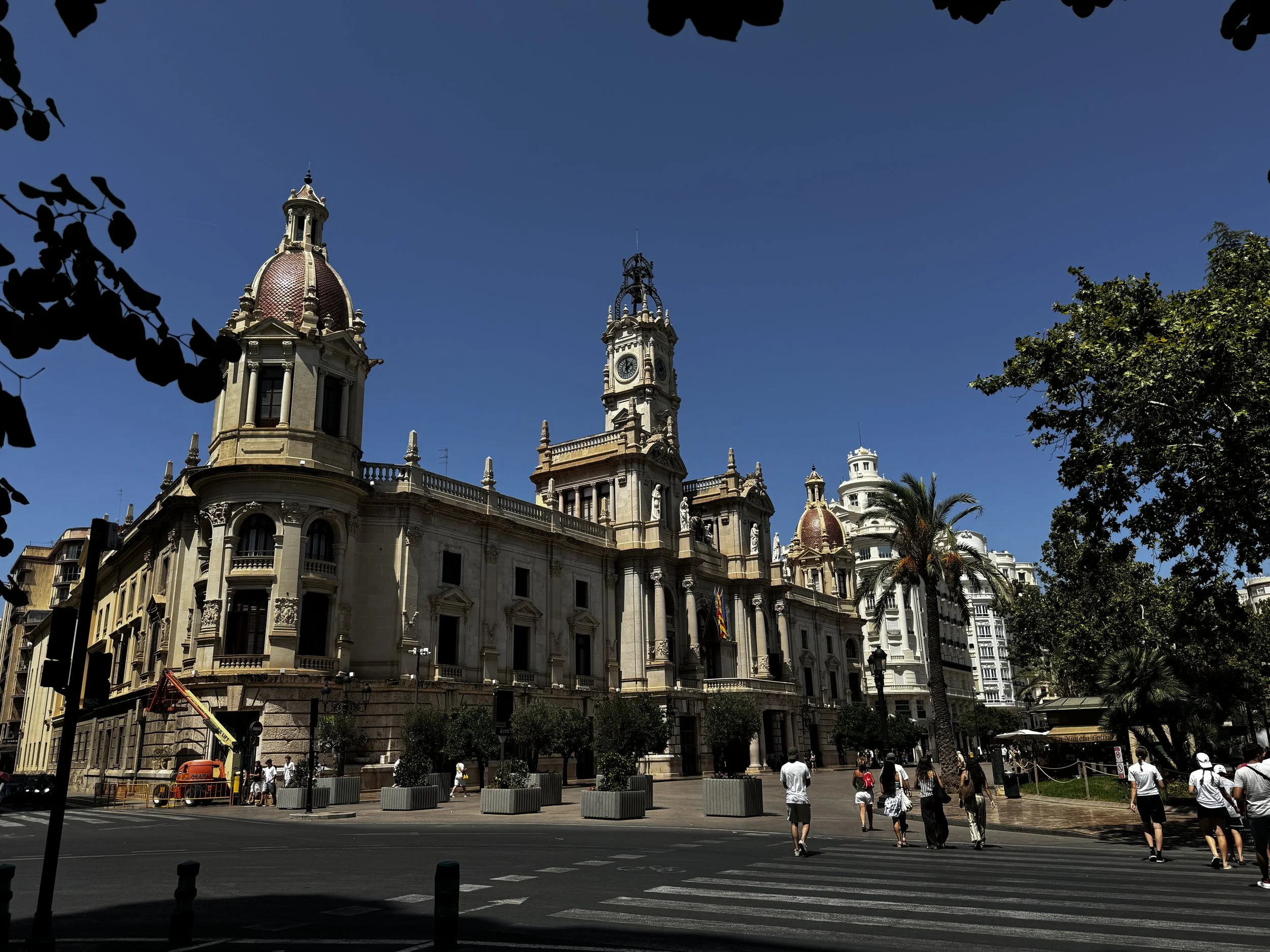 City Hall.  It's open to the public, includes a great museum (with A/C :)), and features a great balcony to see a beautiful view of Plaza del Ayuntamiento. 
