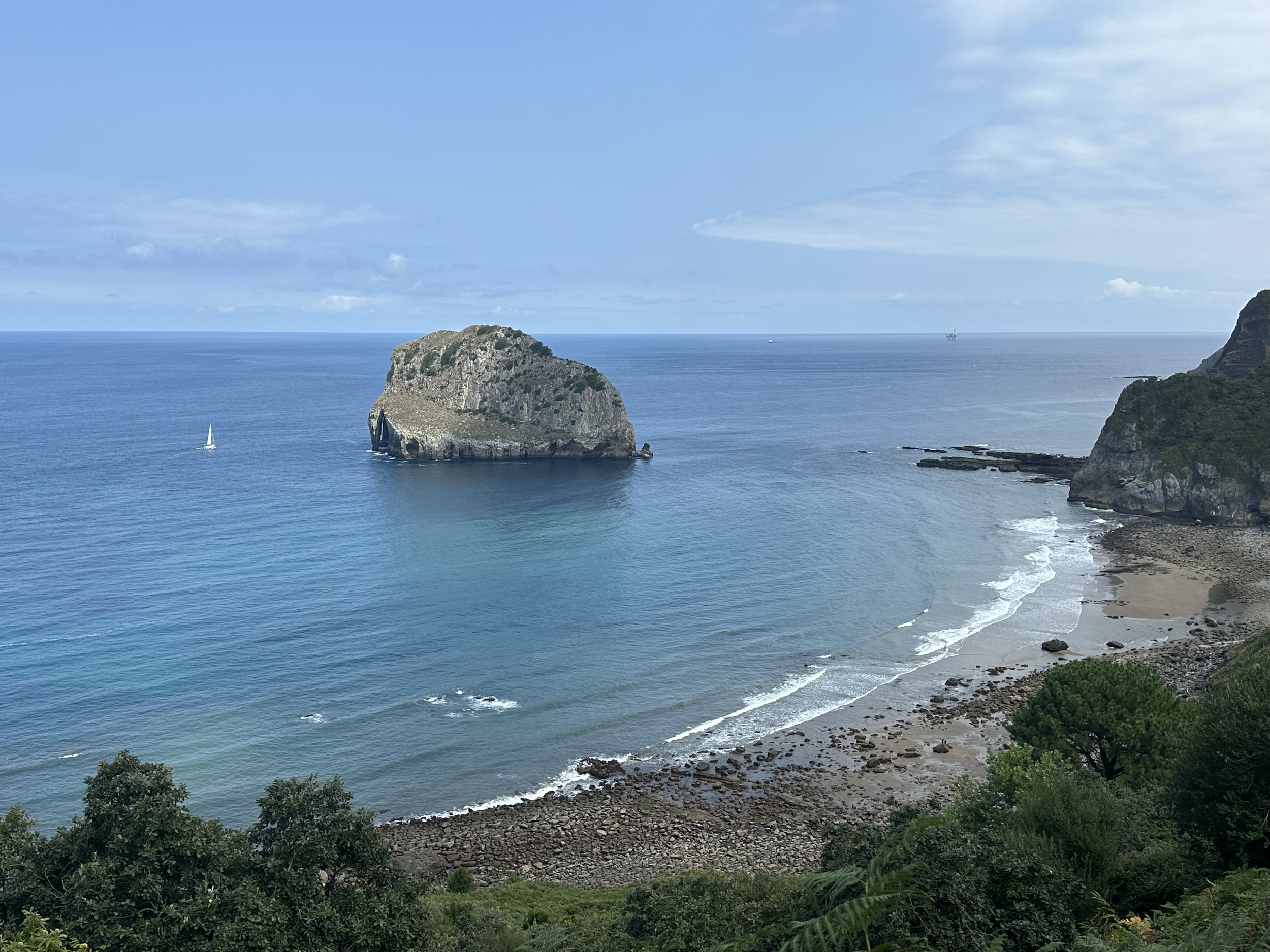 The first views of the coast were absolutely amazing.  Look at that little sailboat making its way toward the rock.  