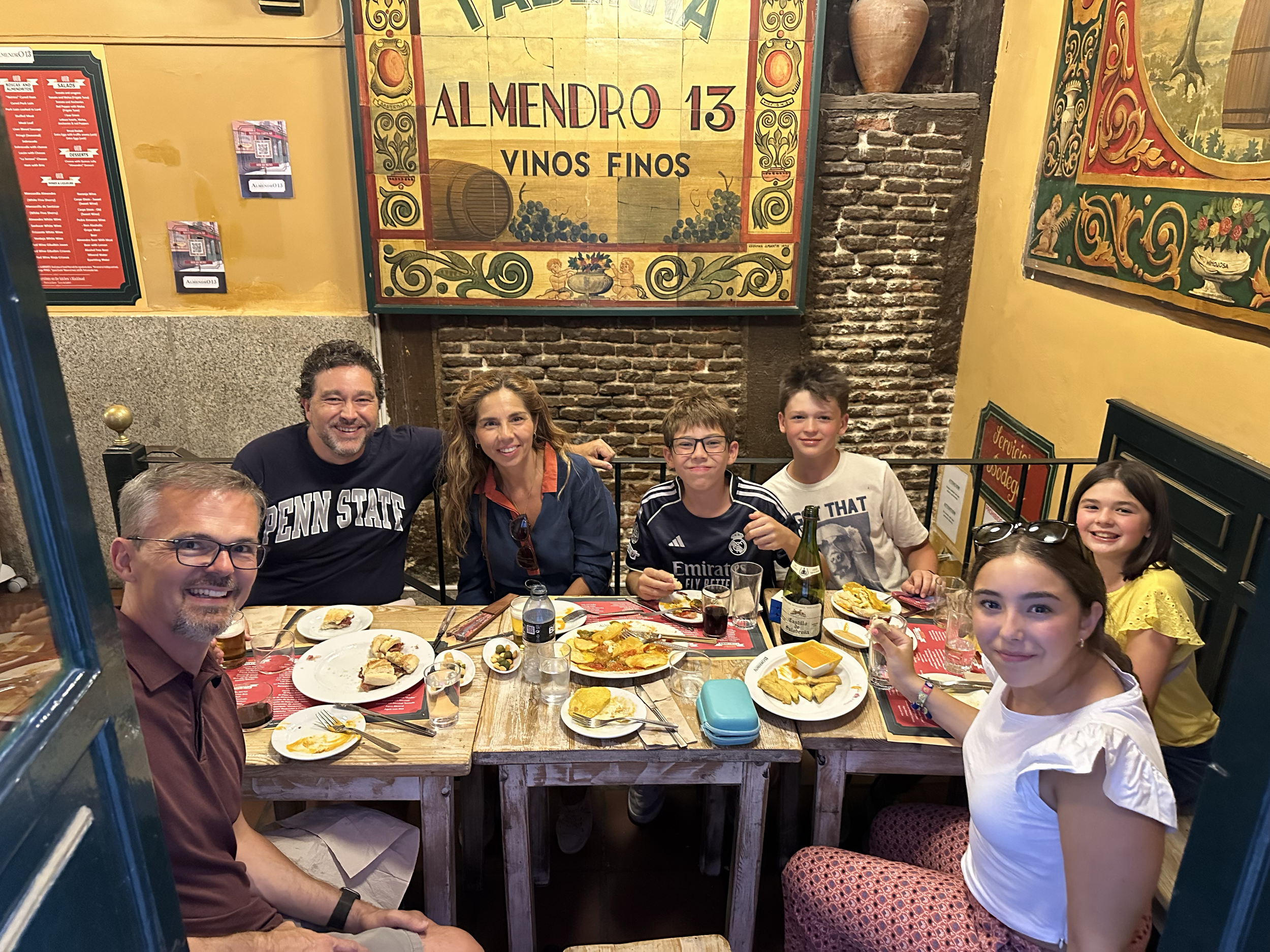 The best part of our trip to Madrid was getting to meet up with Amelia's second grade Spanish teacher, Sra A., and her family.
They took us on a tapas tour of Madrid, and we had a wonderful time!  
