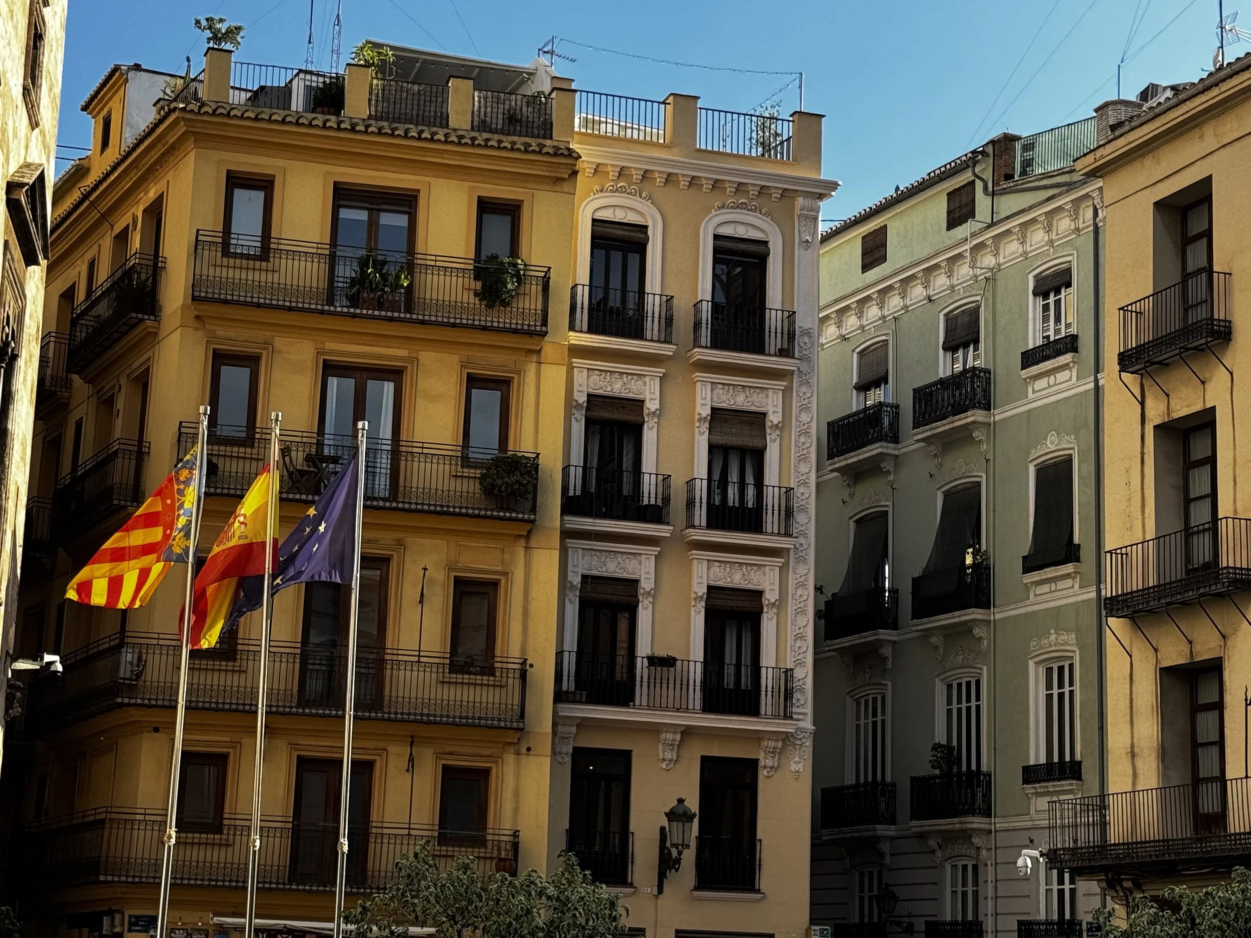 We loved capturing the flags of Valencia, Spain, and the EU right outside the Plaza de la Virgen